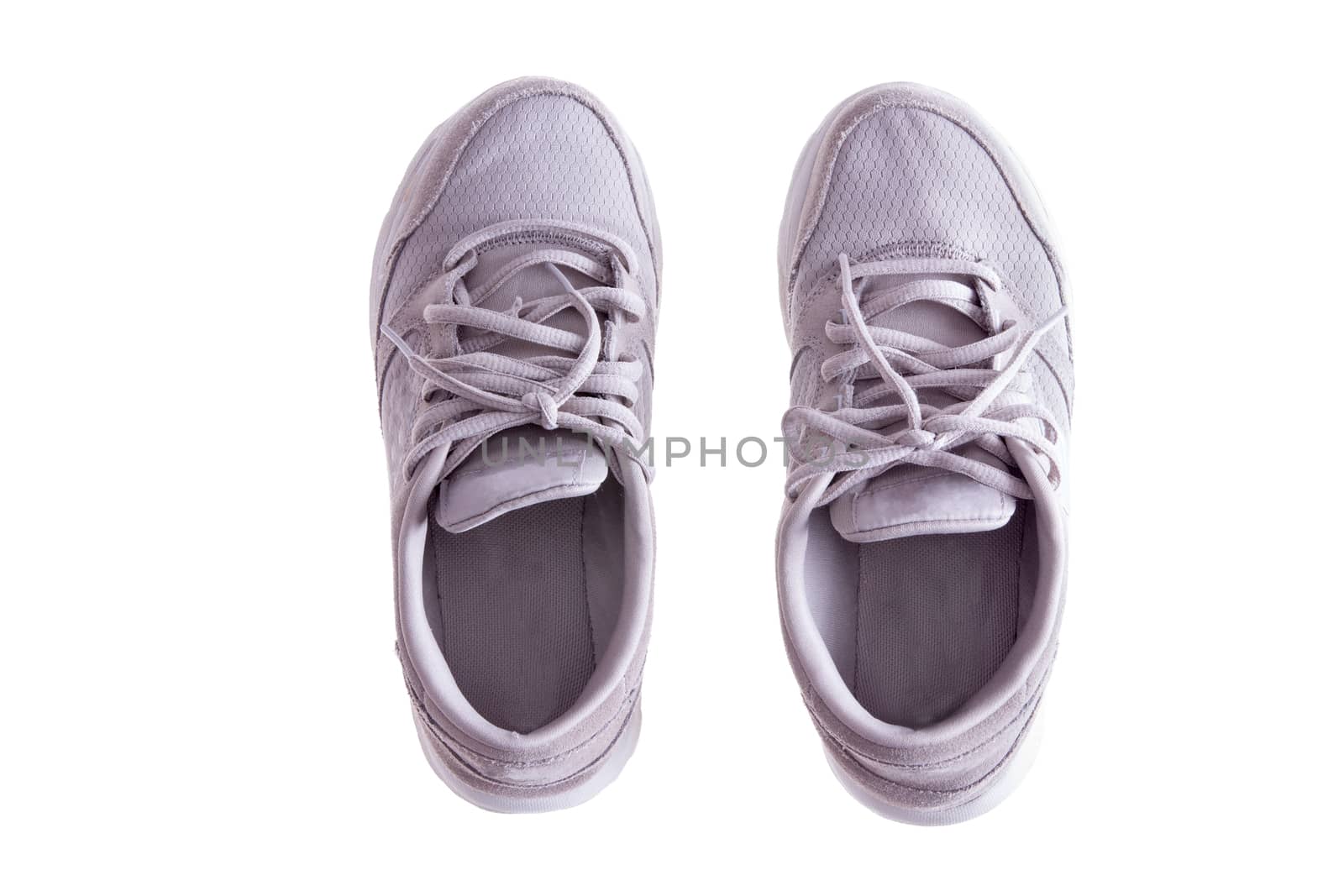 Pair of Worn White Sneakers on White Background by coskun