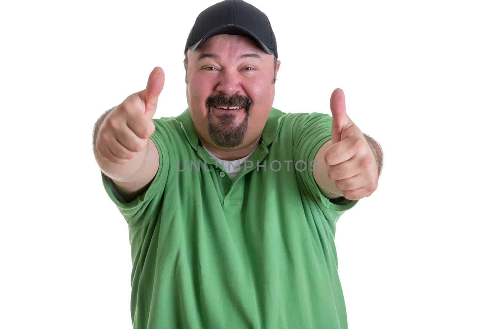 Portrait of Overweight Man with Goatee Wearing Green Shirt and Black Baseball Cap Smiling and Giving Thumbs Up Hand Gesture Toward Camera, on White Background