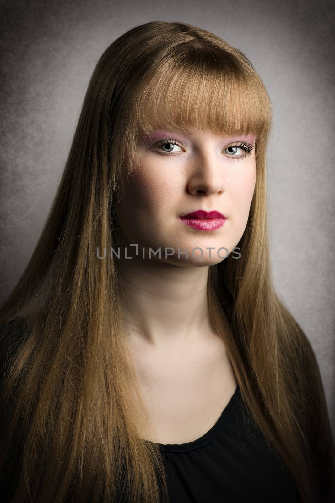 Picturesque portrait of a young blond woman