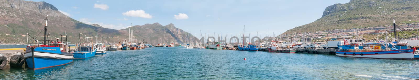 CAPE TOWN, SOUTH AFRICA - DECEMBER 12, 2014:  Panorama of Hout Bay harbor and part of the town