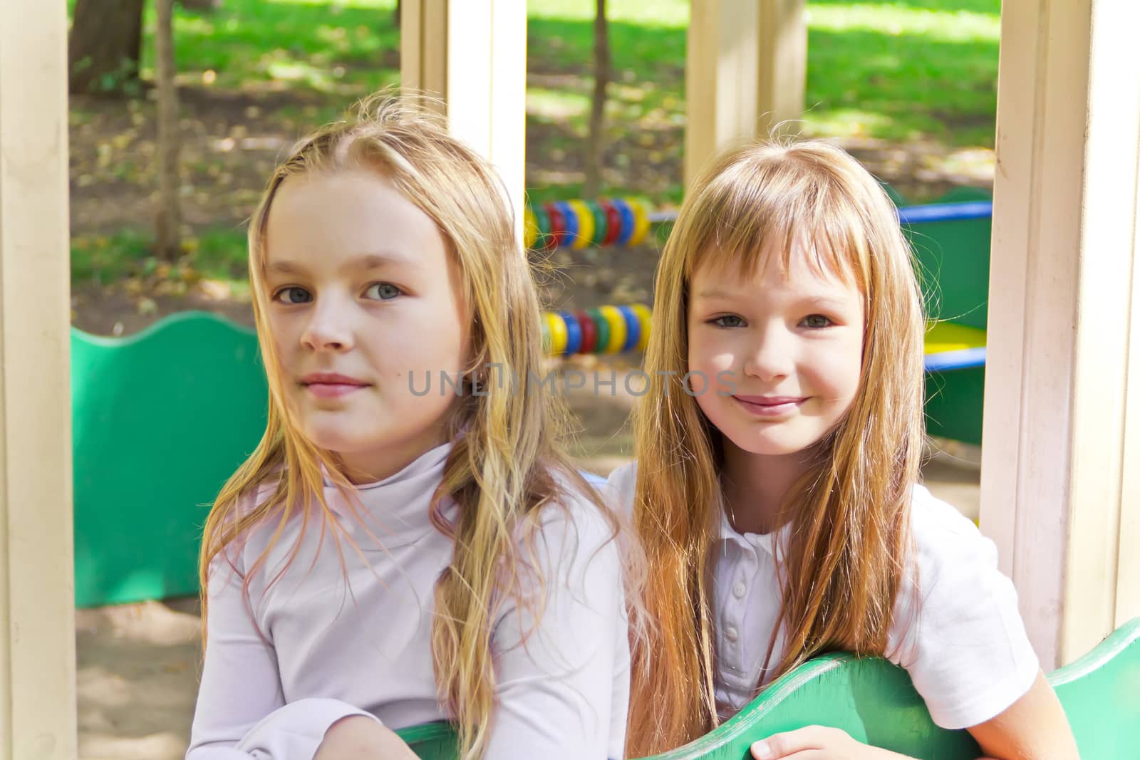 Photo of two cute girls with long hairs