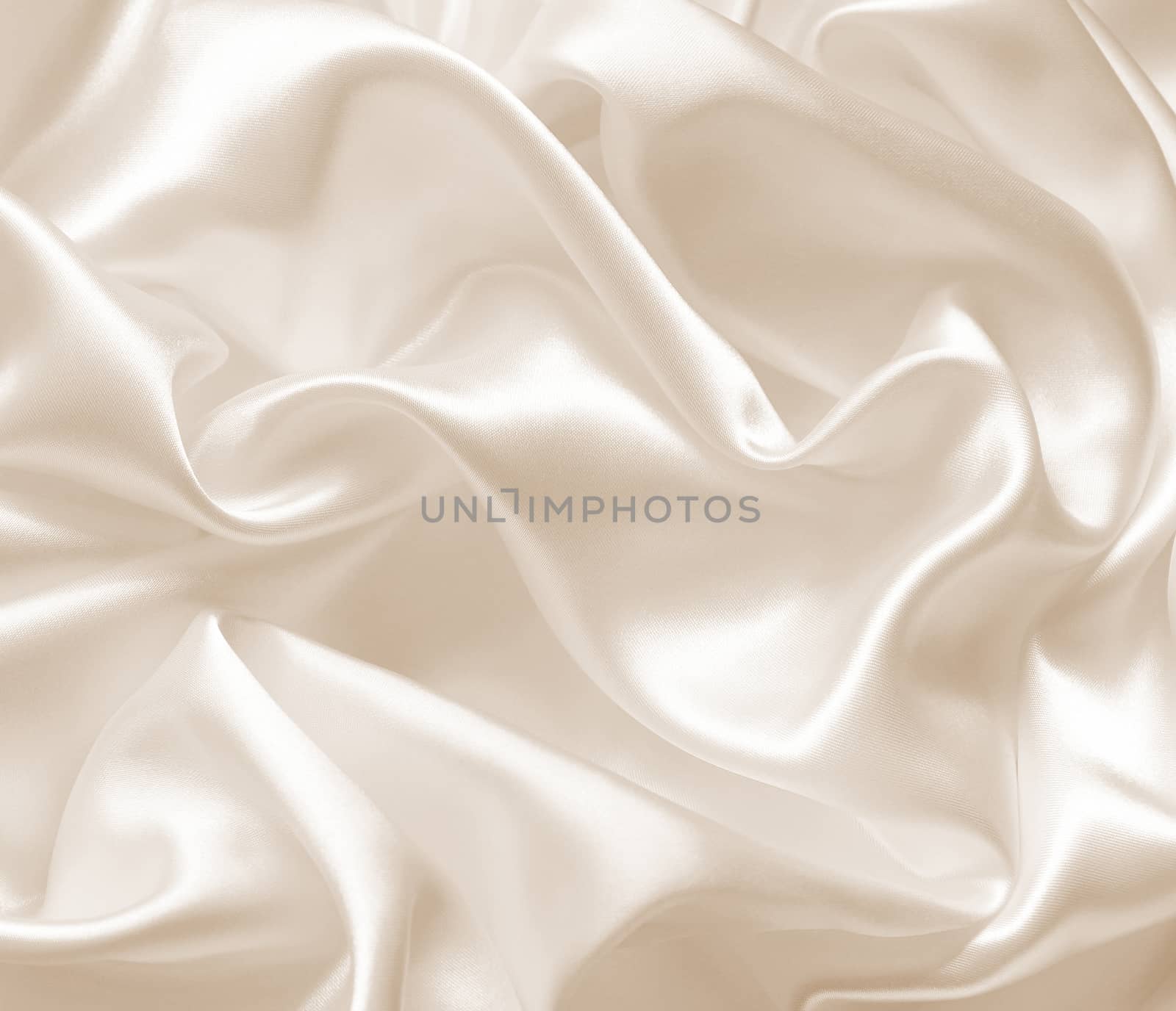 Smooth elegant golden silk as wedding background. In Sepia toned by oxanatravel