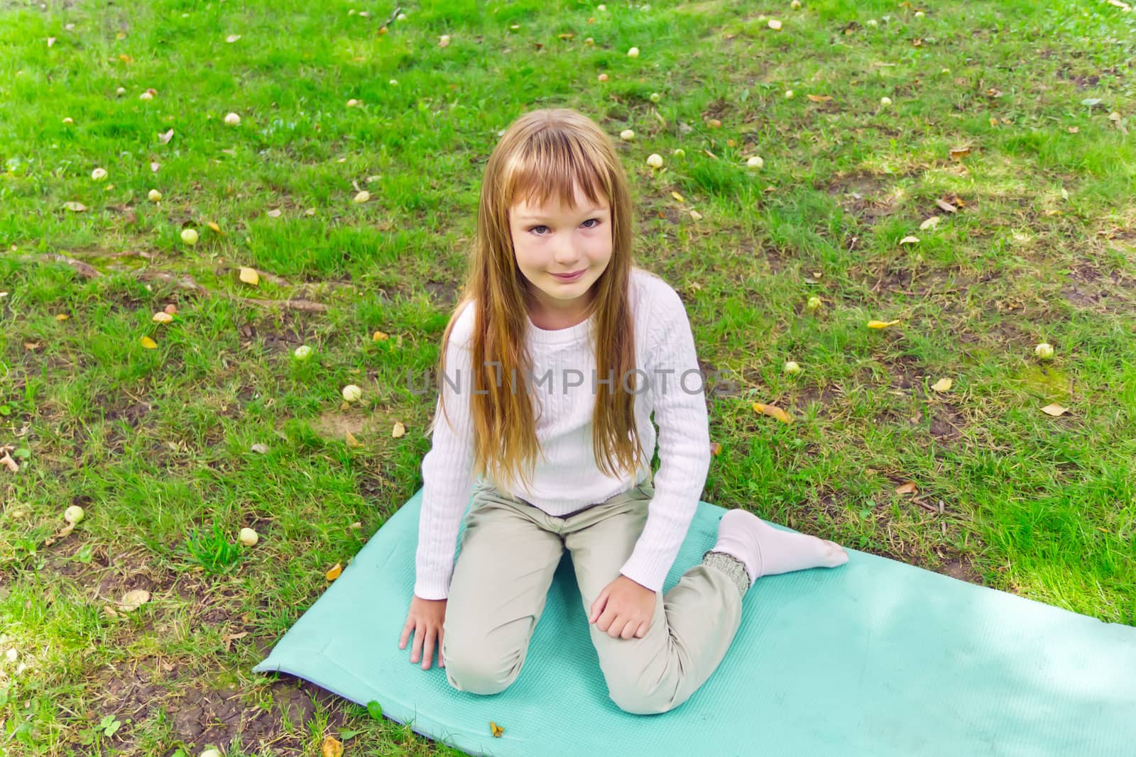 Photo of cute playing girl in summer