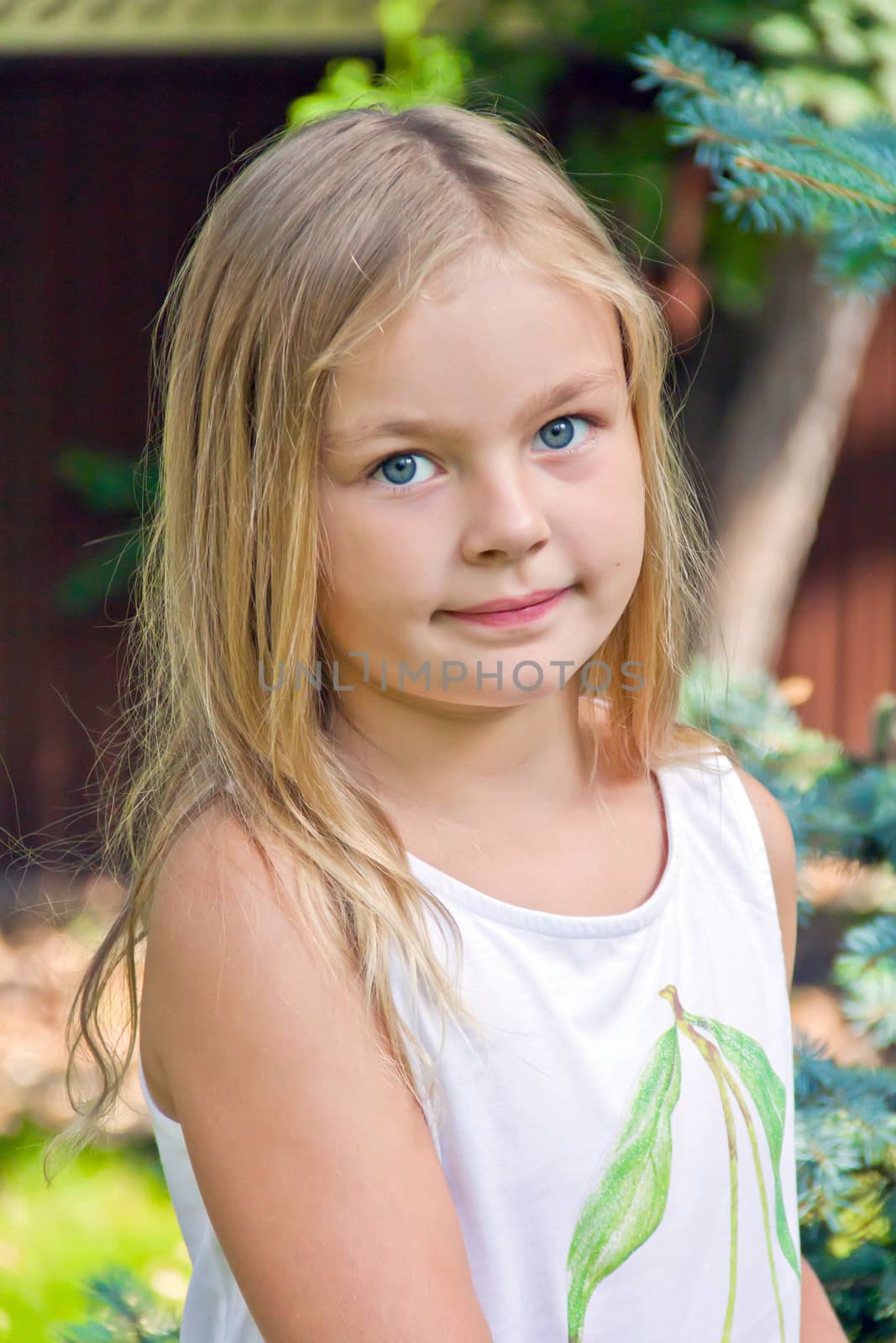 Photo of cute girl with big blue eyes