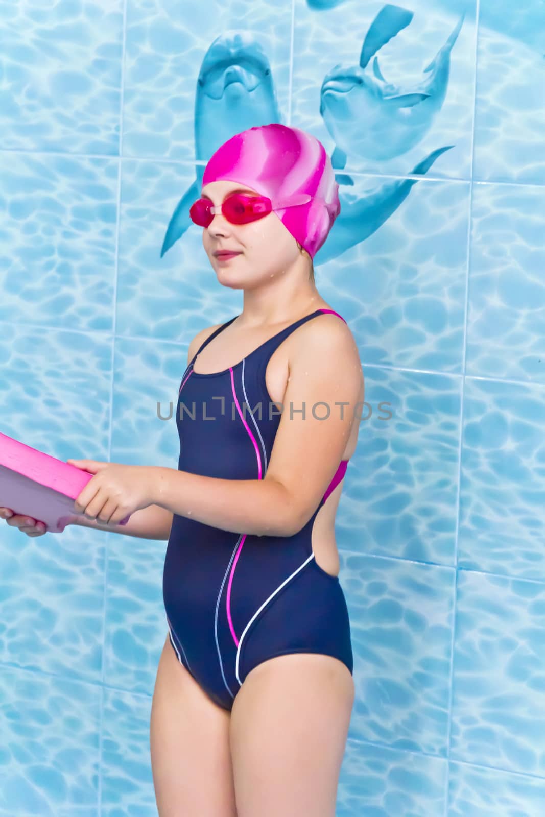 Photo of cute girl in swimming pool