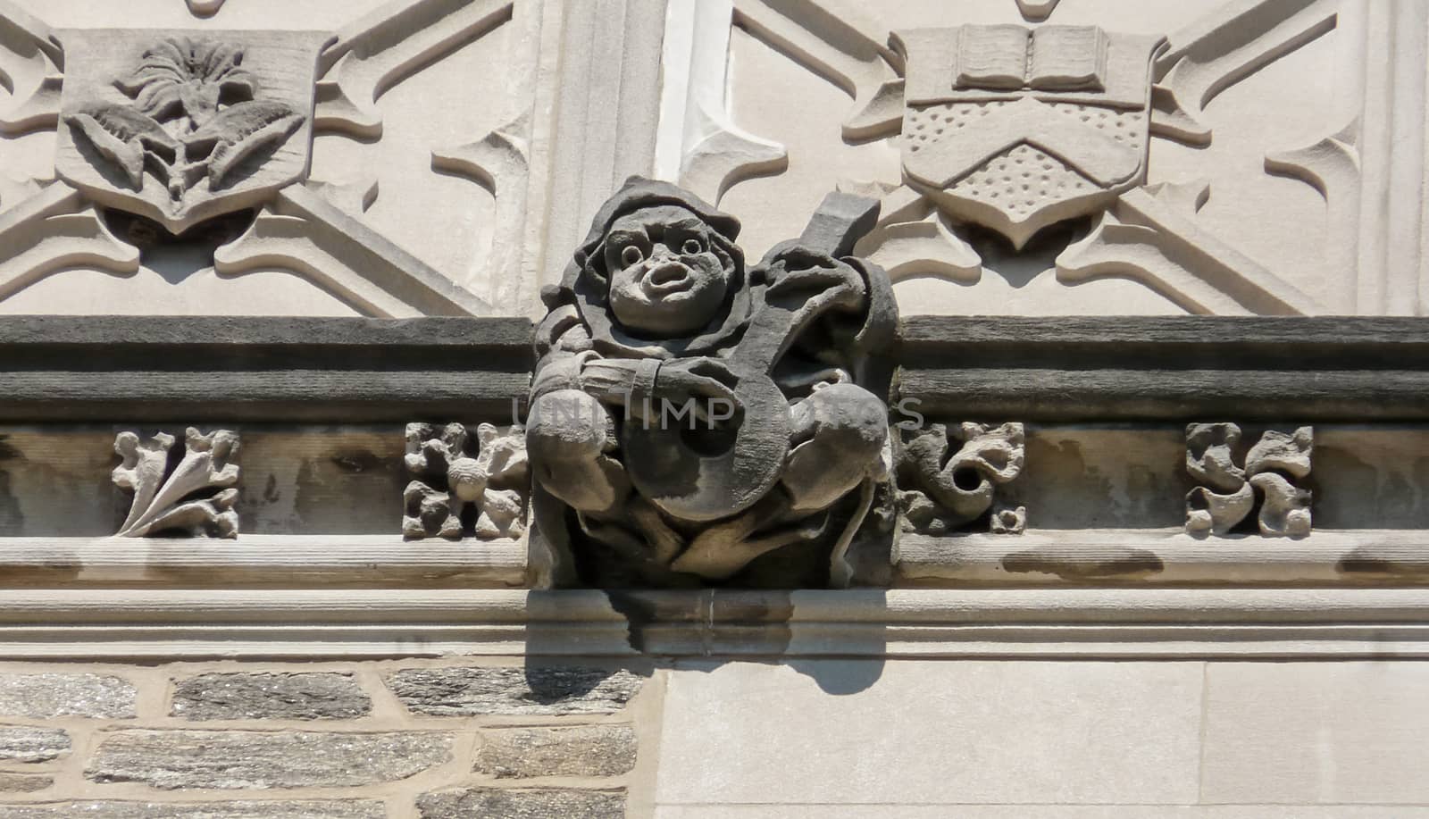 PRINCETON, NJ - OCTOBER 20: Colorful autumn in one of the best and oldest universities in USA, belonging to elite Ivy Leaque, classified at the 1-st place in ranking. Detailed view of high reliefs at the top of famous Blair Arch, October 20, 2013 in Princeton, NJ