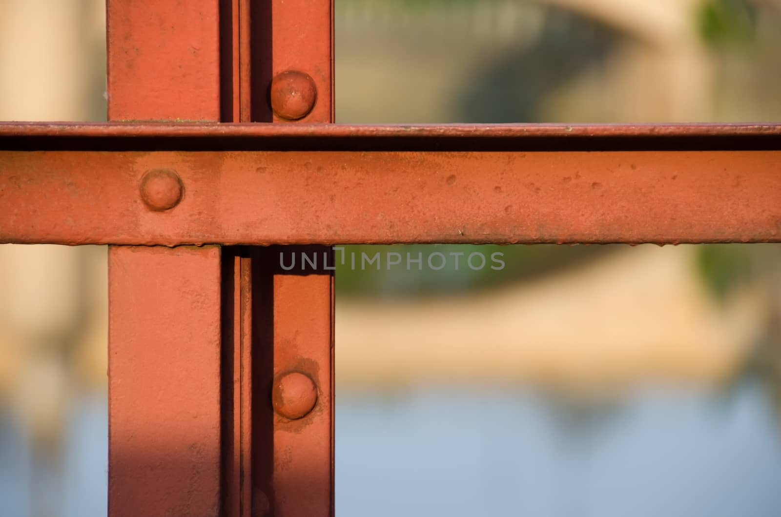 Red iron bridge construction with blur background