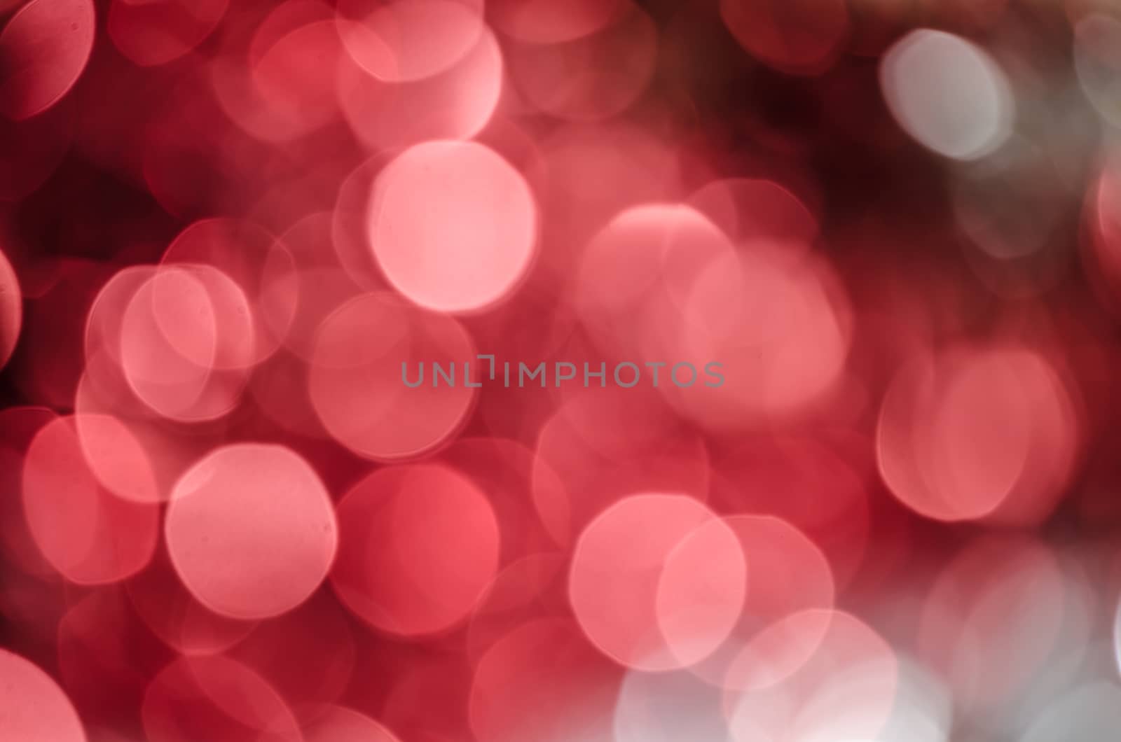 Red silver circle blur lights as christmas background.