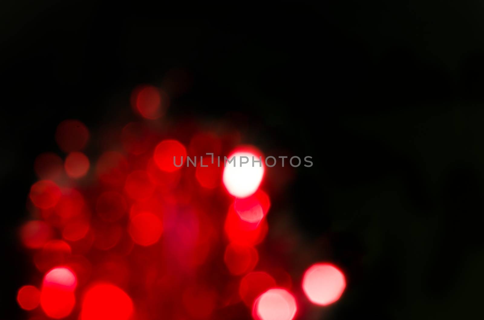 Red blur circle lights flame as abstract background.