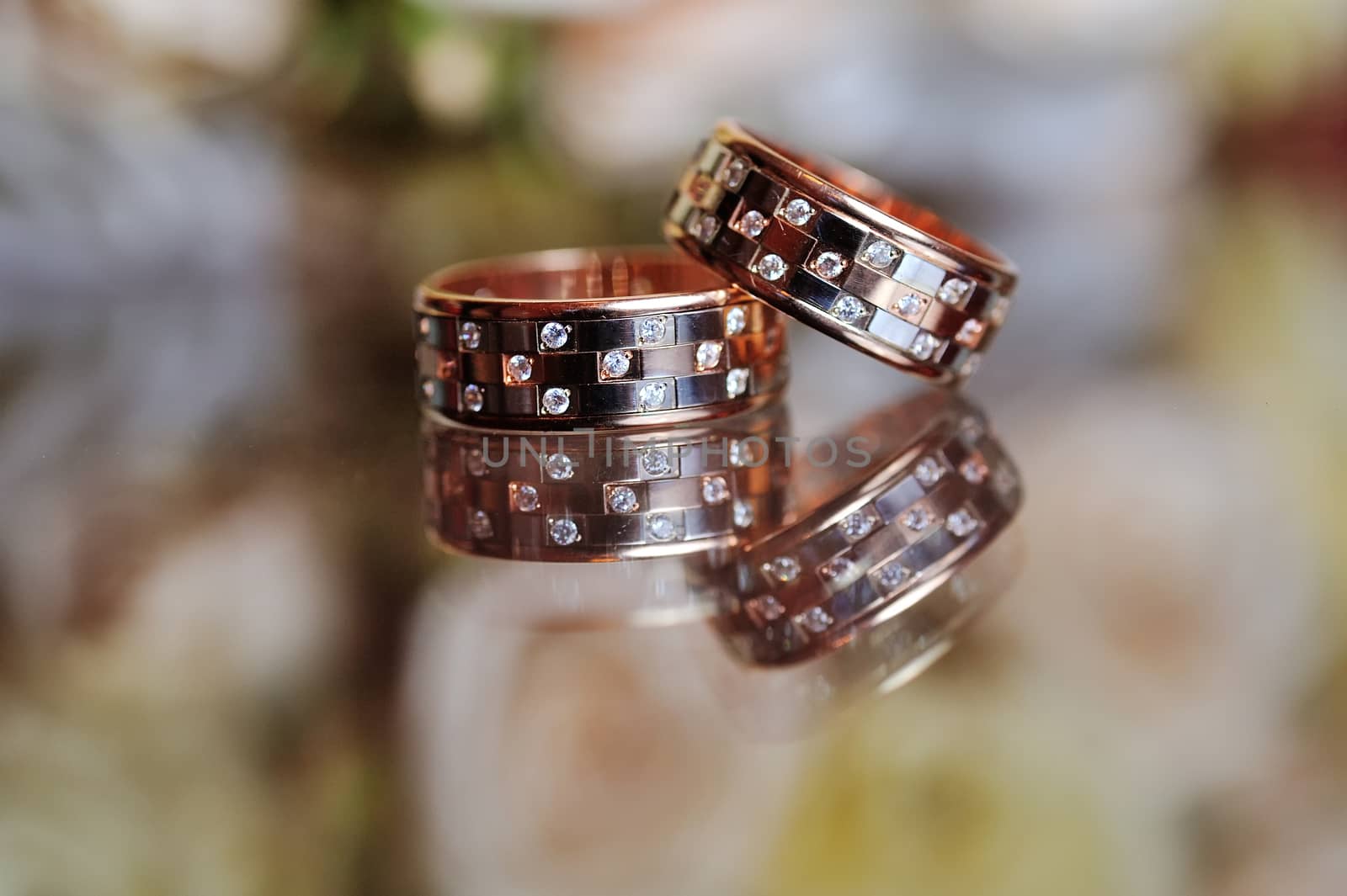 Pair of wedding rings on table.