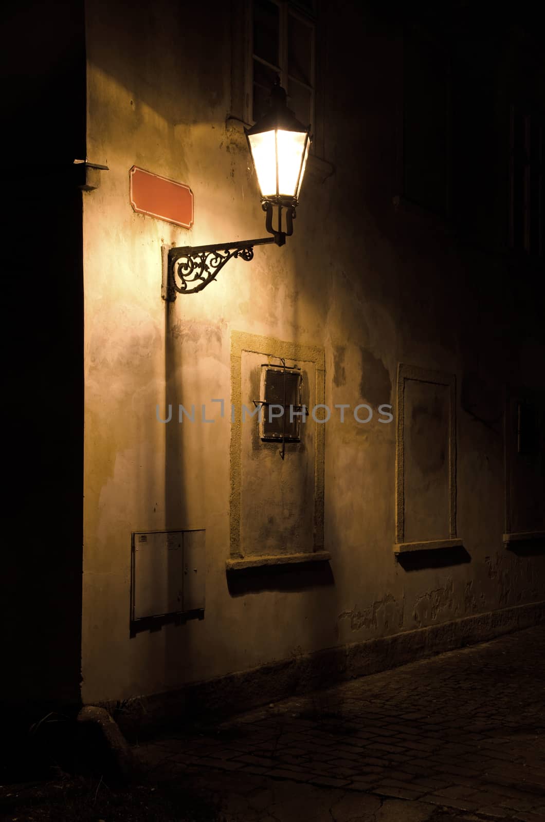 Street at night, nice street light and red sign. 