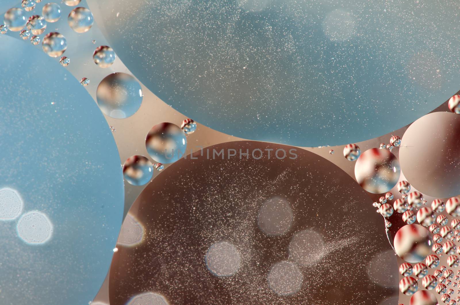A lot of oil drops on blur colorful background. 