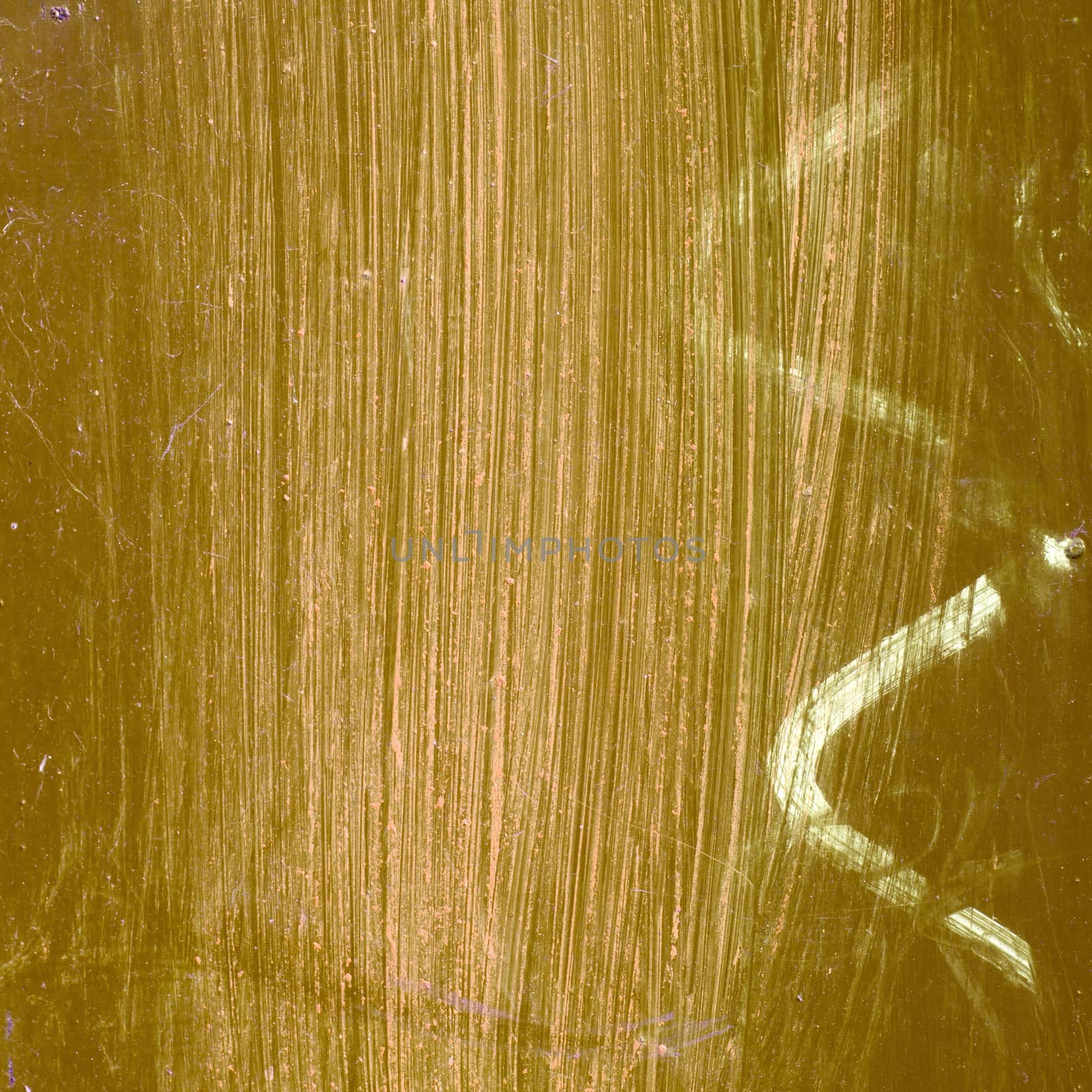 Detail of gold iron surface with white lines. 