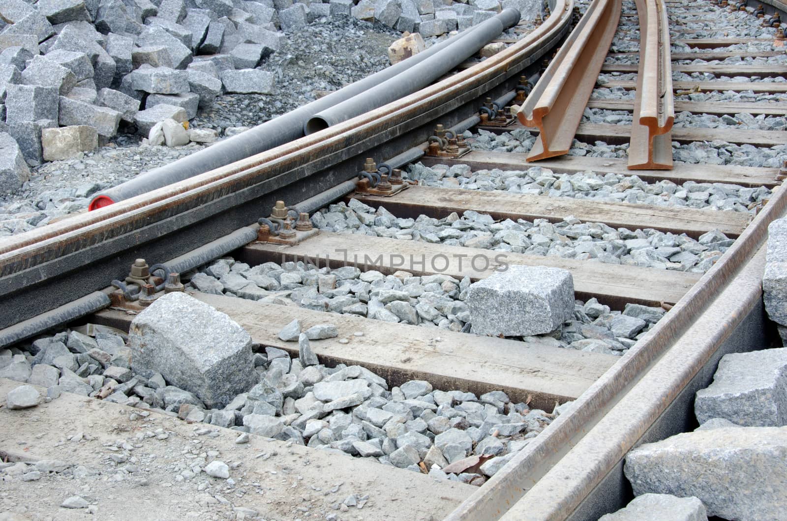 Repairing tram track, stone blocks and pipes.