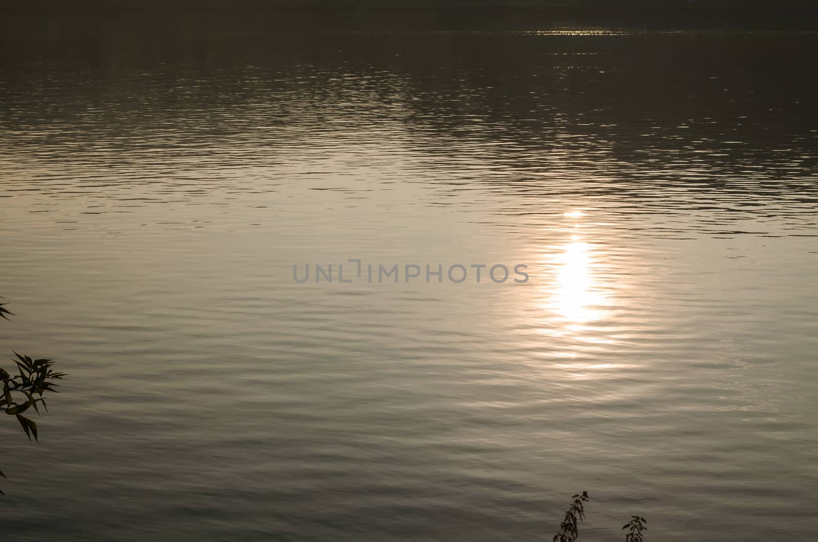 Sun Reflection at dusk on a lake.