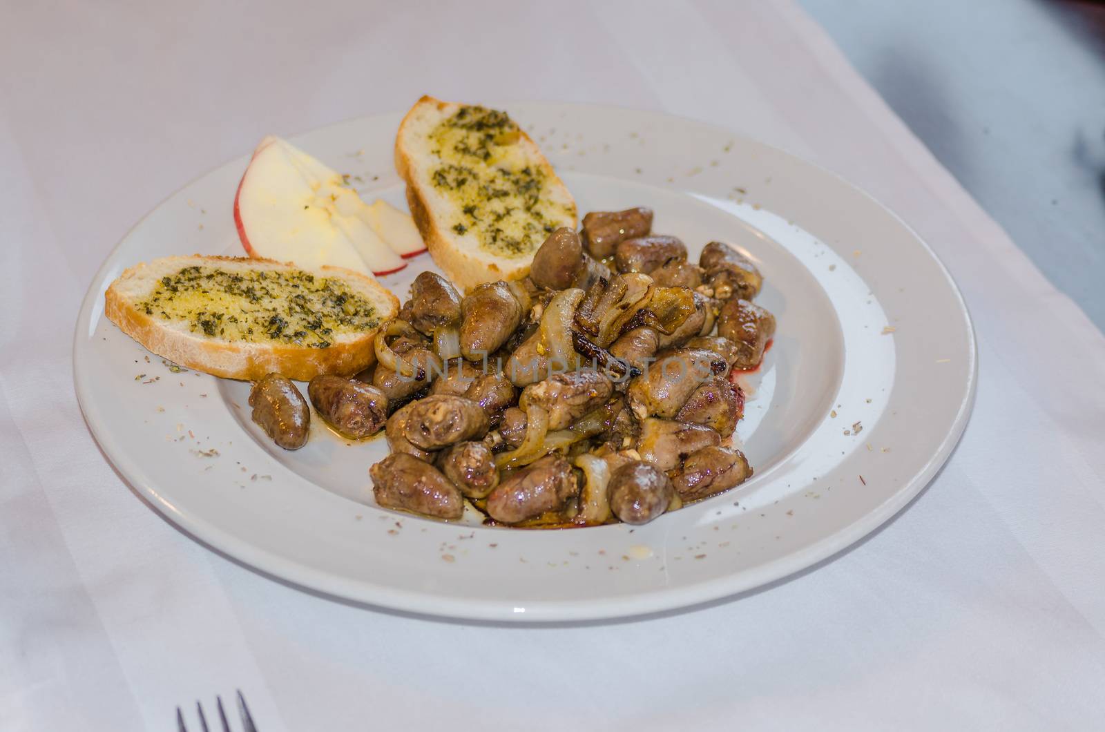 Chicken hearts with garlic bread
