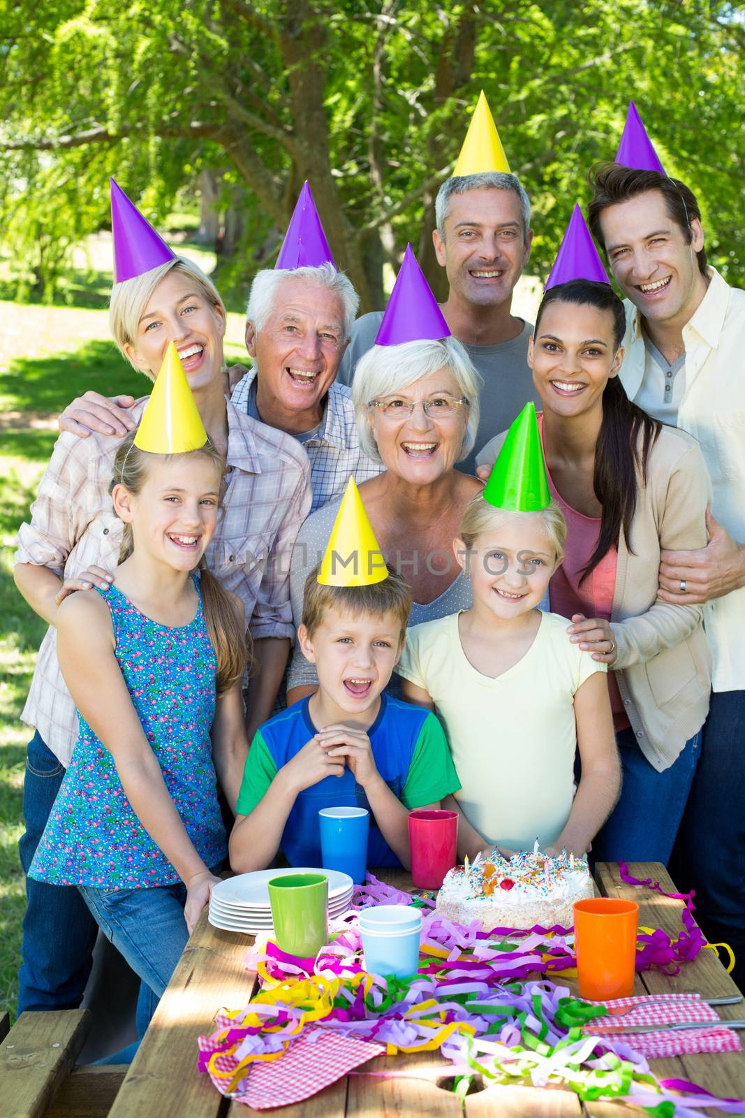 Happy family celebrating a birthday  by Wavebreakmedia