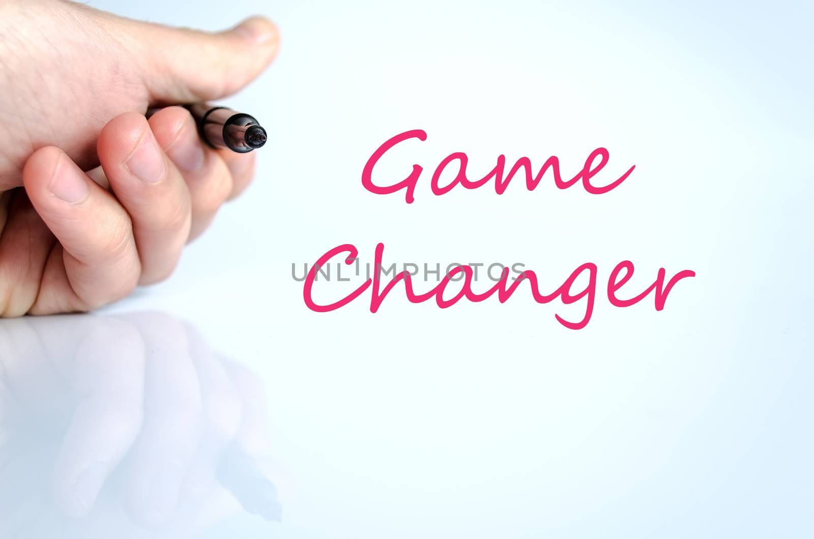 Pen in the hand isolated over white background game changer concept