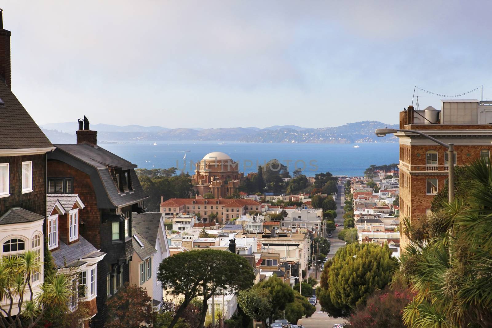 Russian consulate (right). Baker street in San Francisco. View of the bay and Palace Of Fine Arts