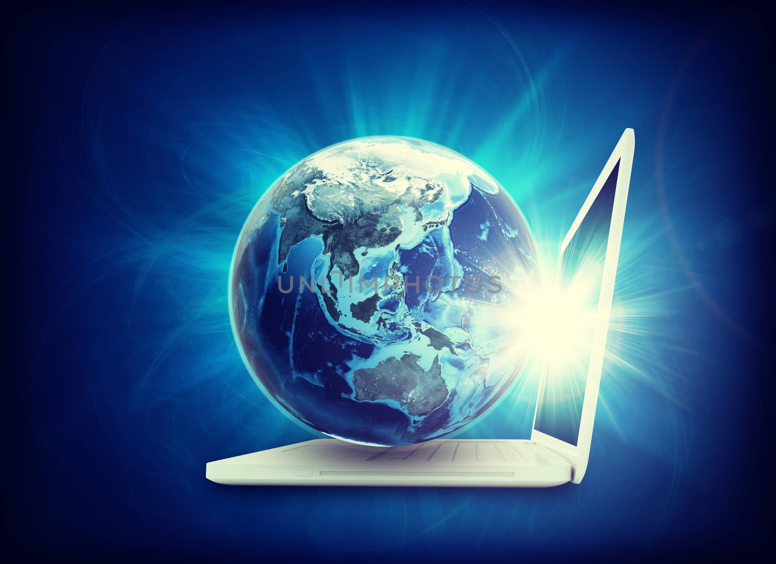 Earth model on laptop on abstract blue background, side view. Elements of this image furnished by NASA