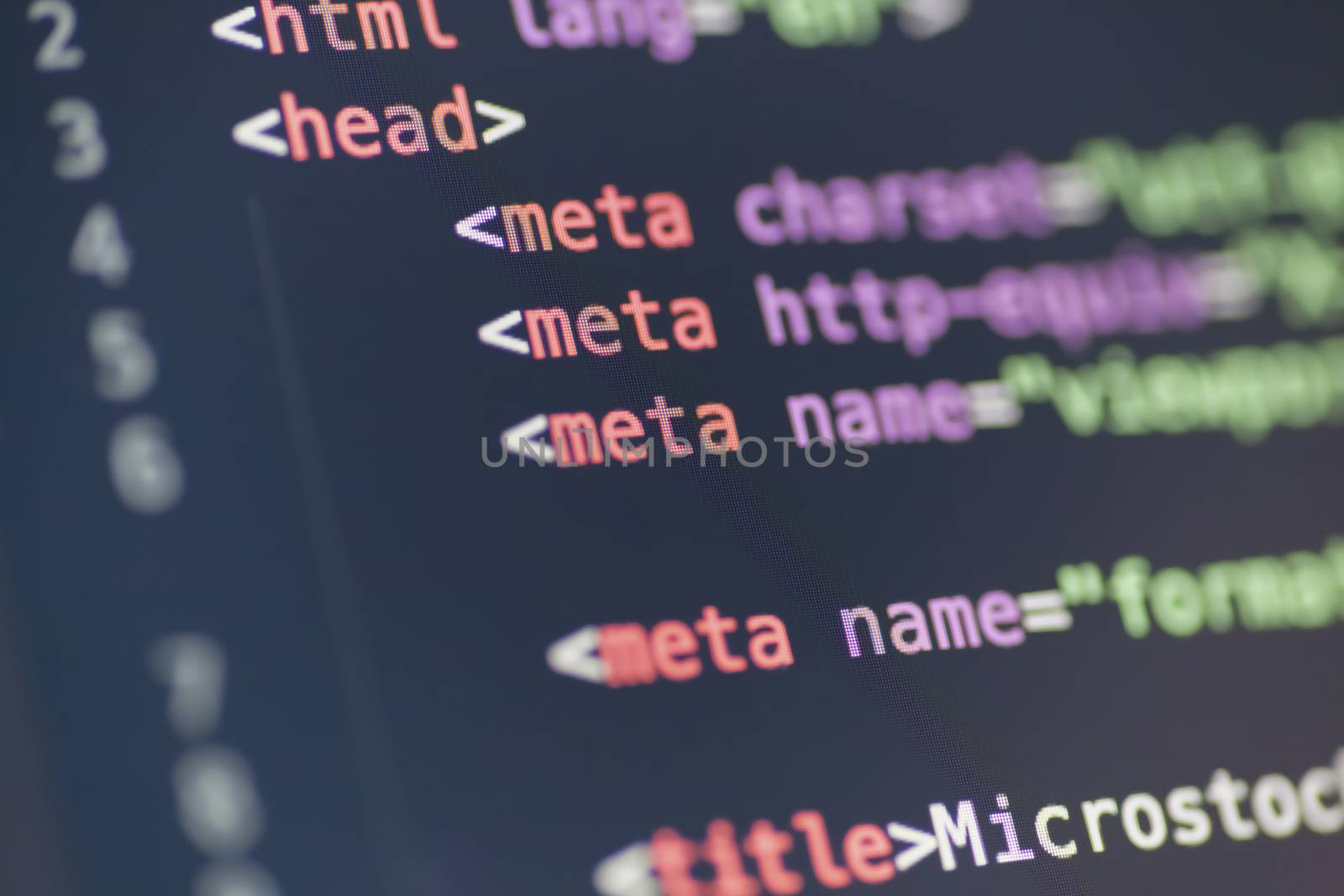 HTML meta tag code on computer screen by photovibes