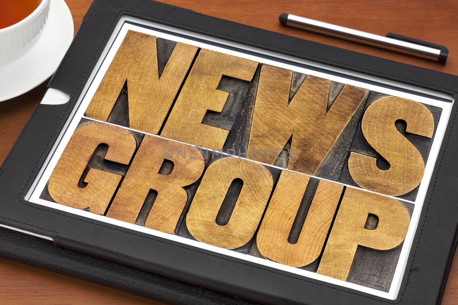 newsgroup word typography on tablet by PixelsAway