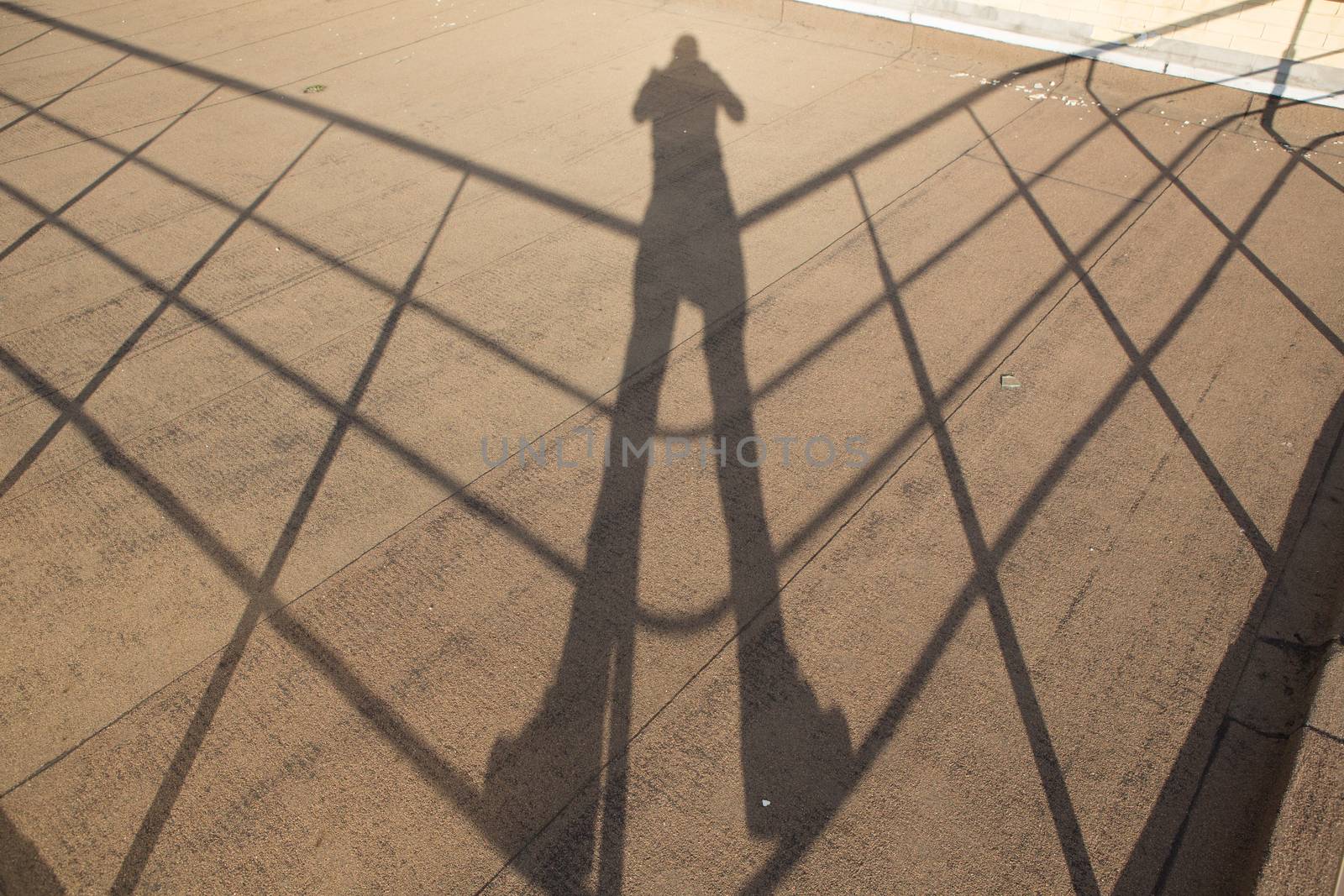 Shadow of a photographer by sarymsakov