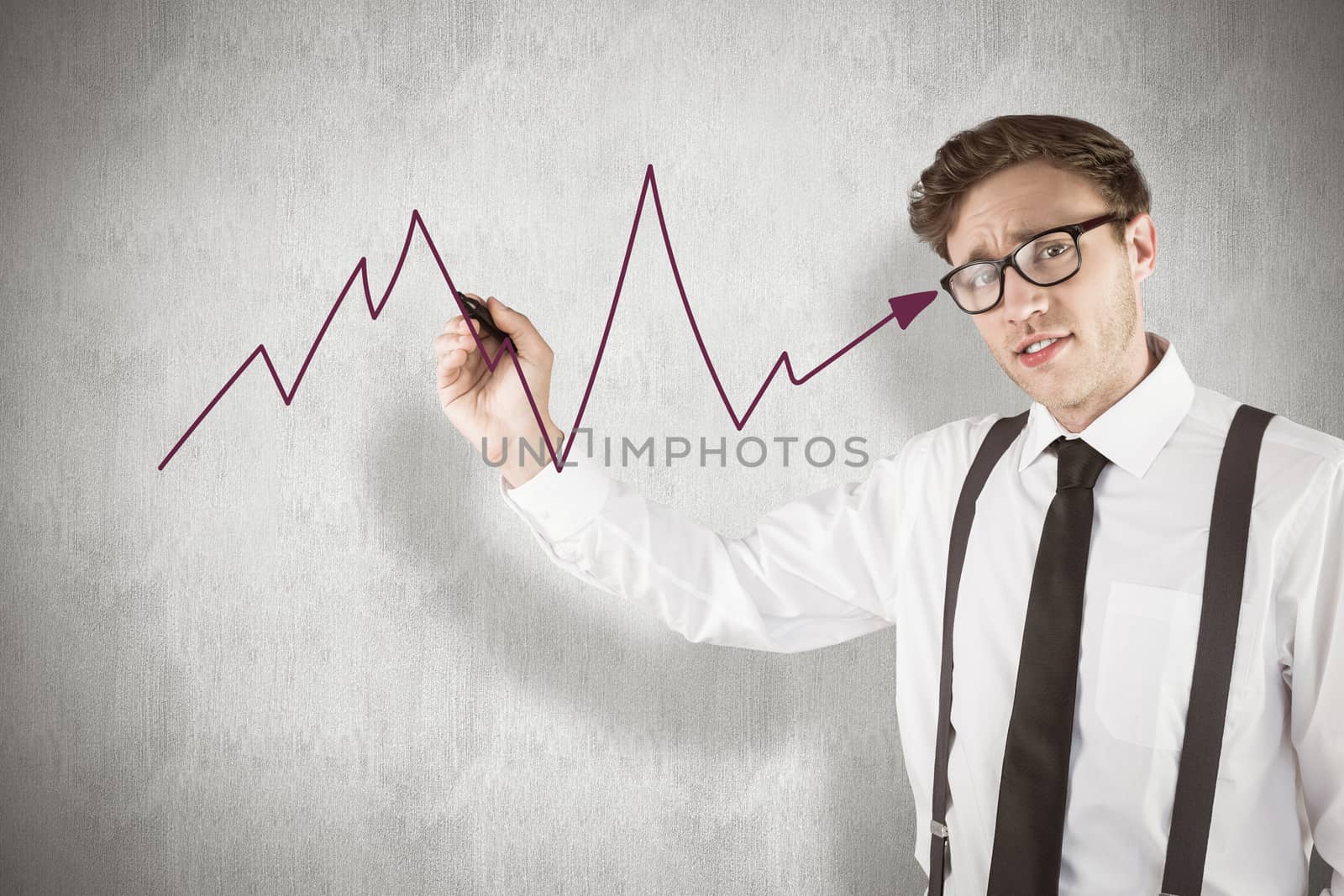 Geeky businessman writing with marker against white background