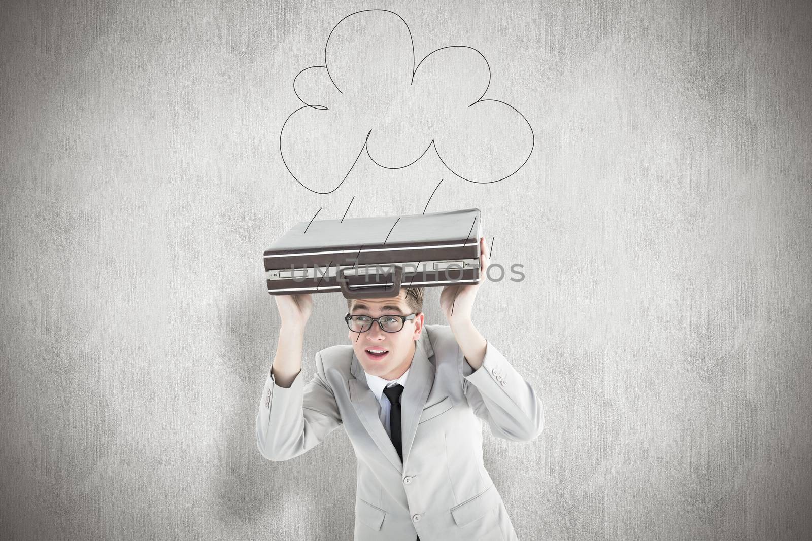 Geeky businessman holding his briefcase over head against white background