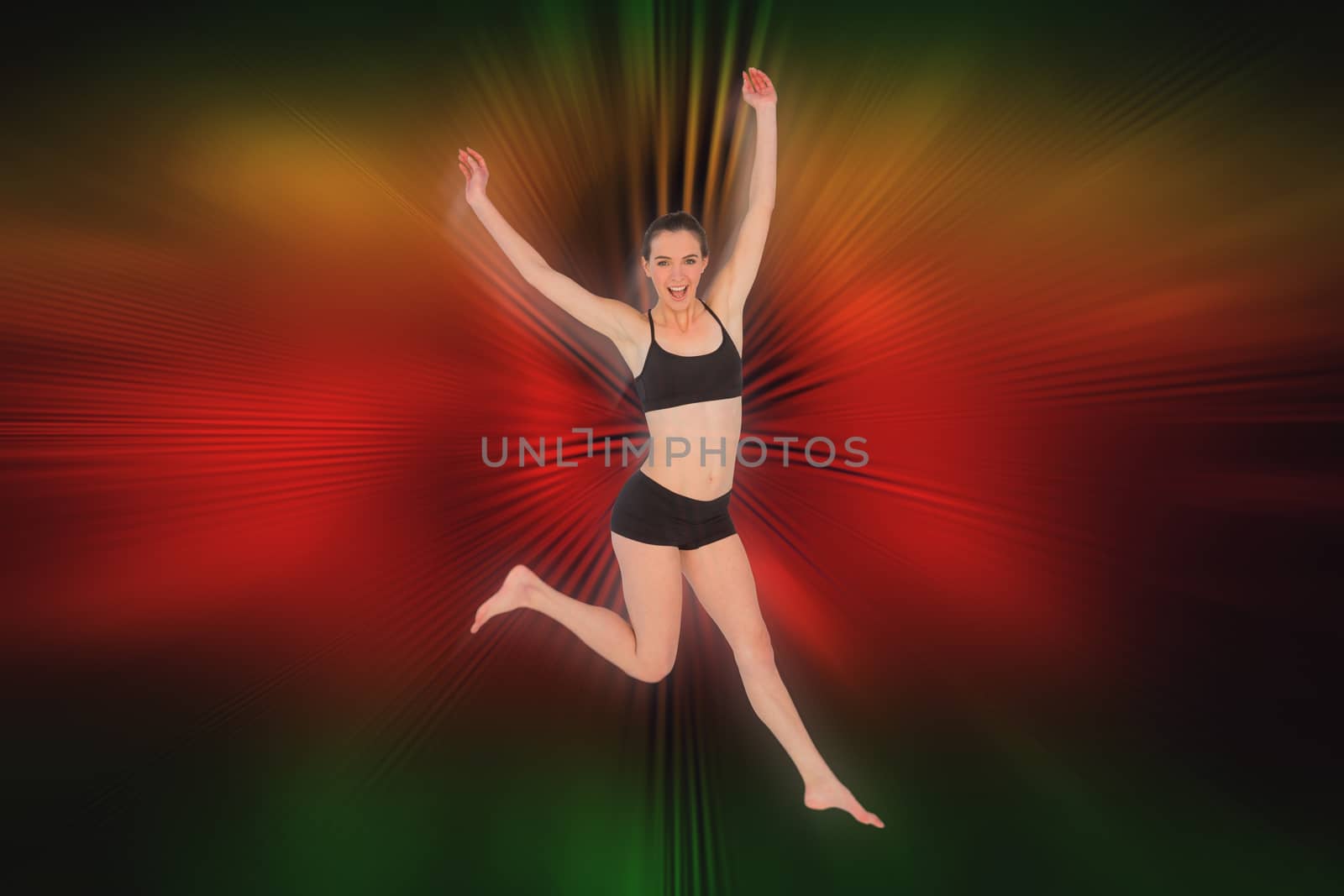Composite image of full length of a sporty young woman jumping by Wavebreakmedia