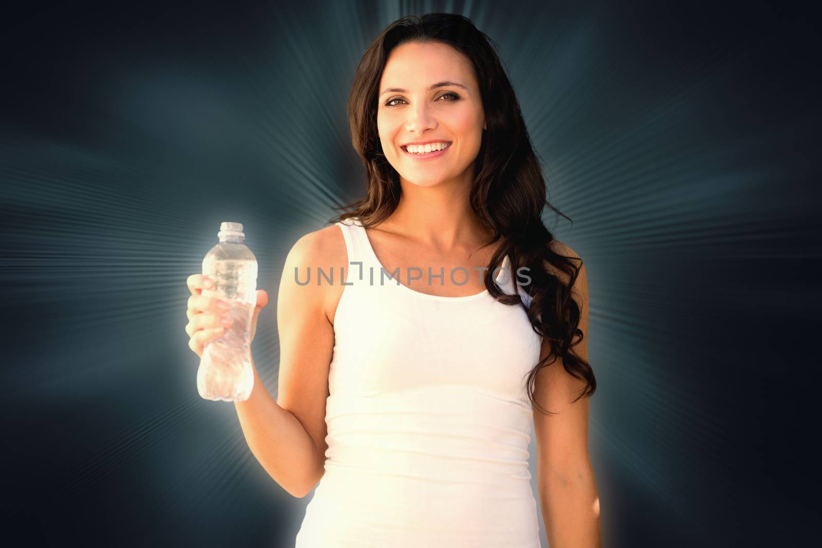 Brunette with water bottle against abstract background