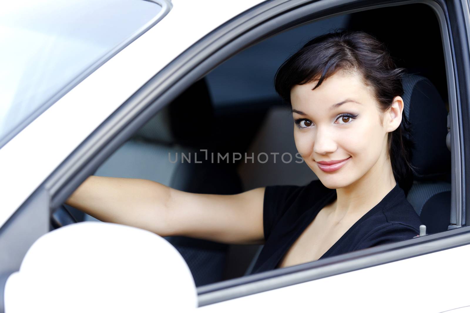 Pretty girl in a car