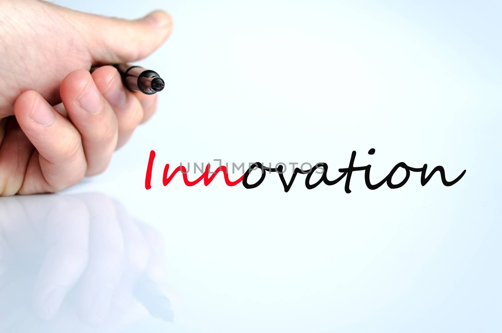 Pen in the hand isolated over white background innovation concept
