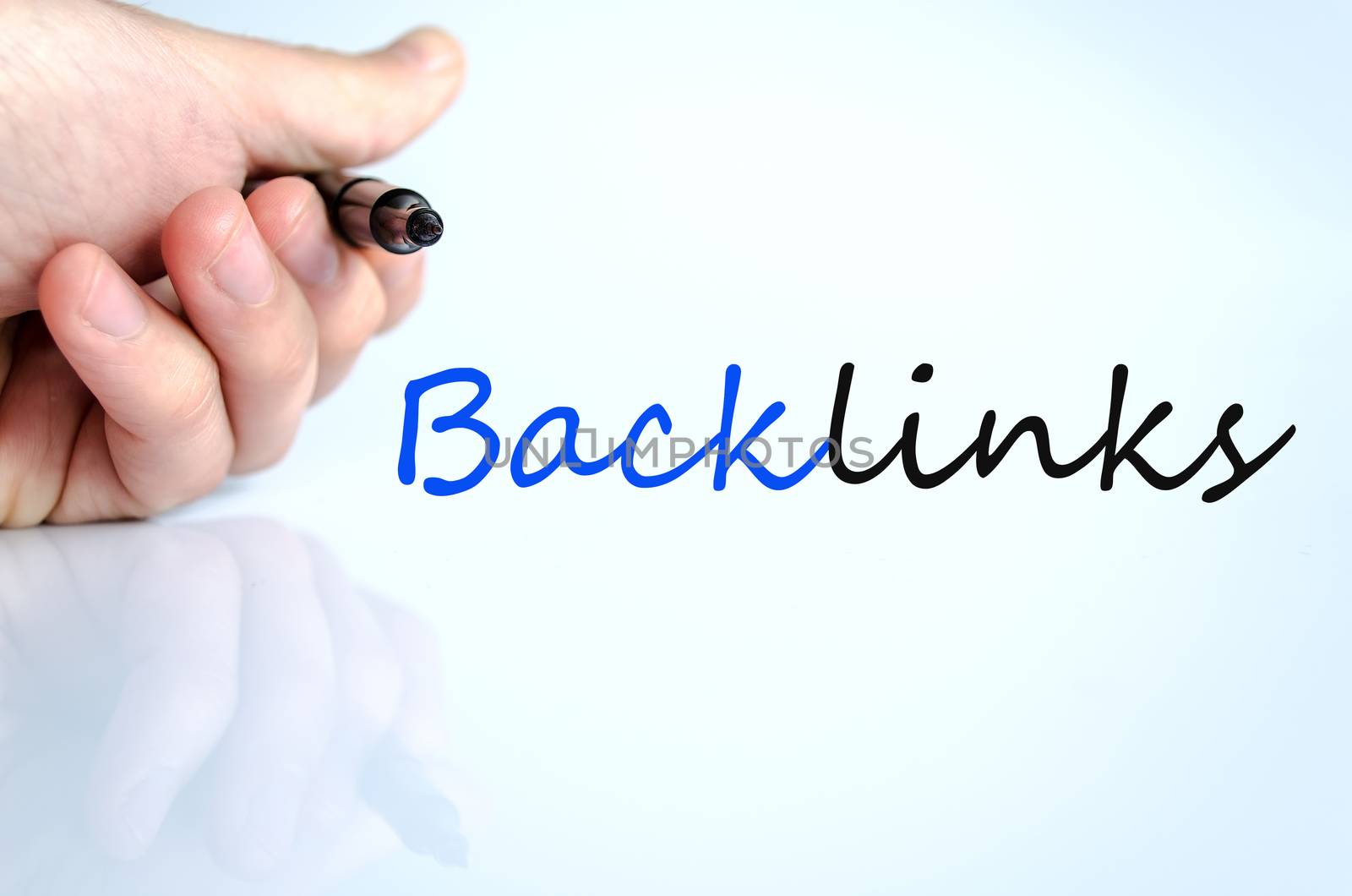 Pen in the hand isolated over white background backlinks concept