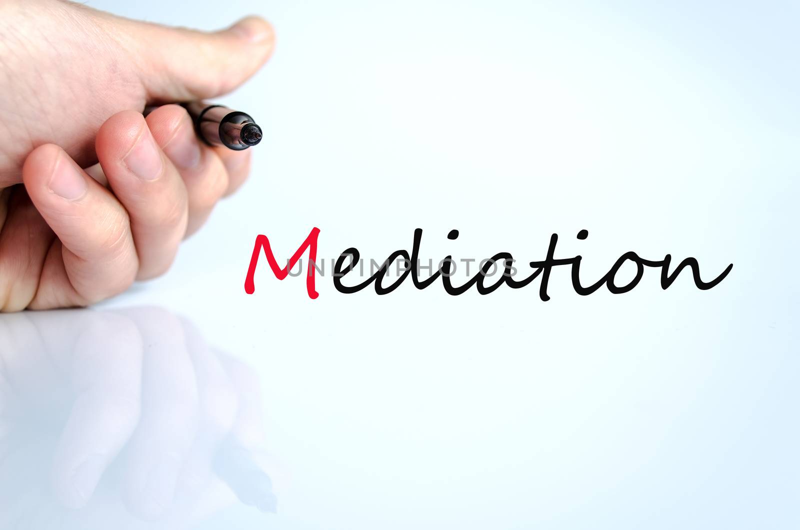Pen in the hand isolated over white background mediation concept