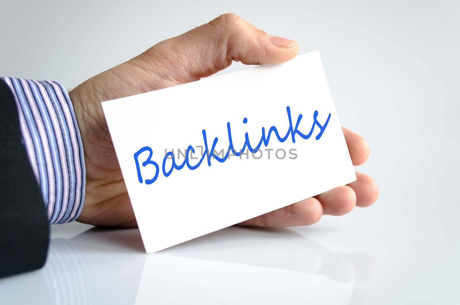 Business man hand writing backlinks