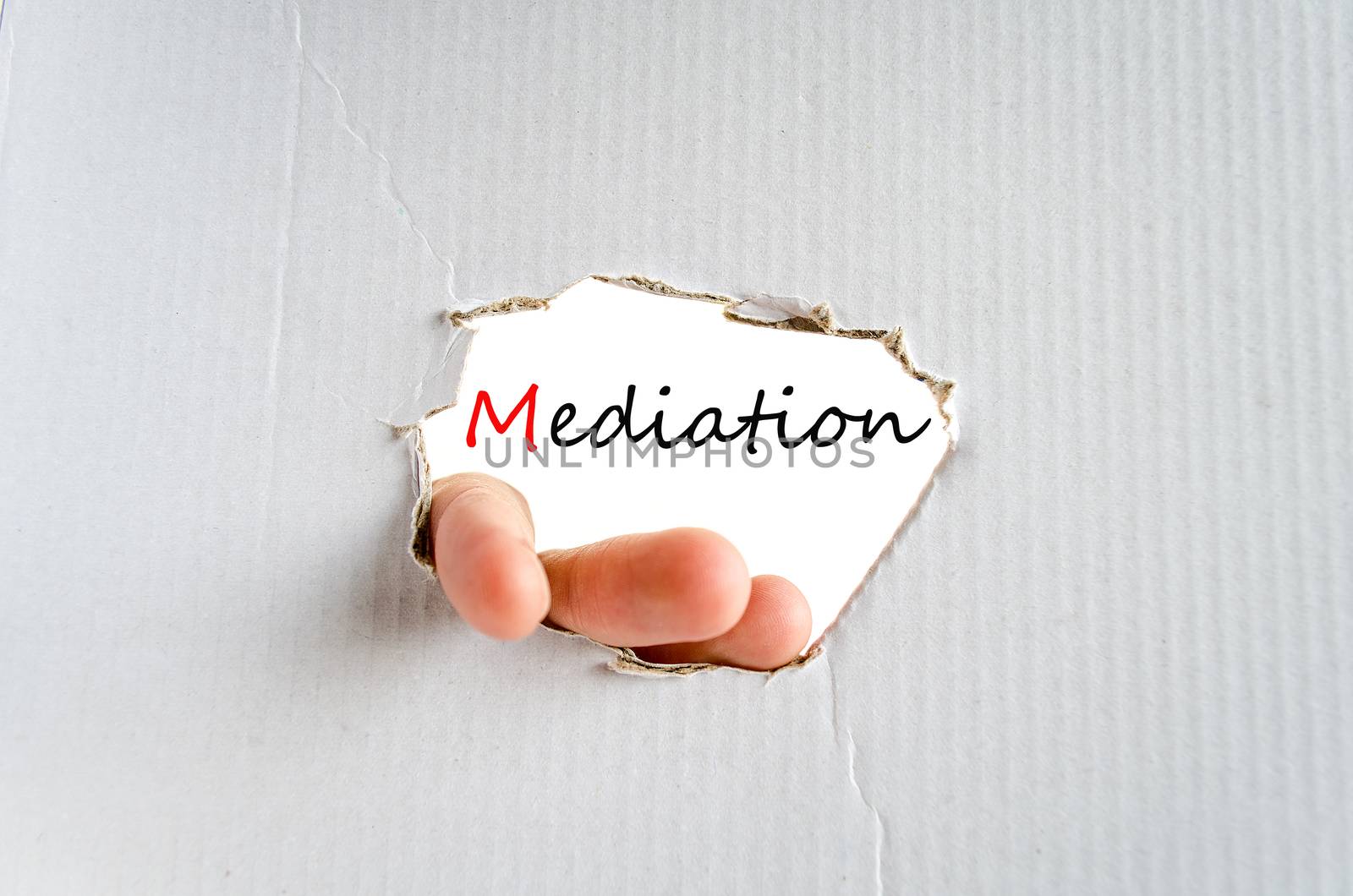 Hand on the cardboard background mediation concept