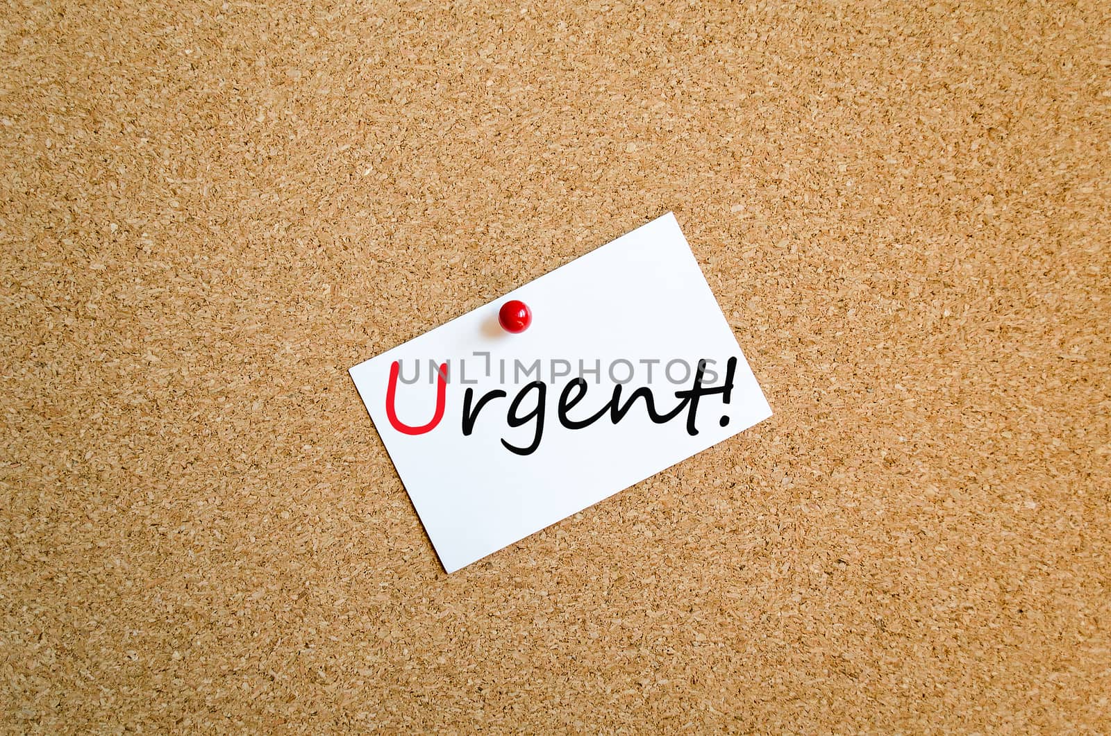 Sticky Note On Cork Board Background Urgent Concept