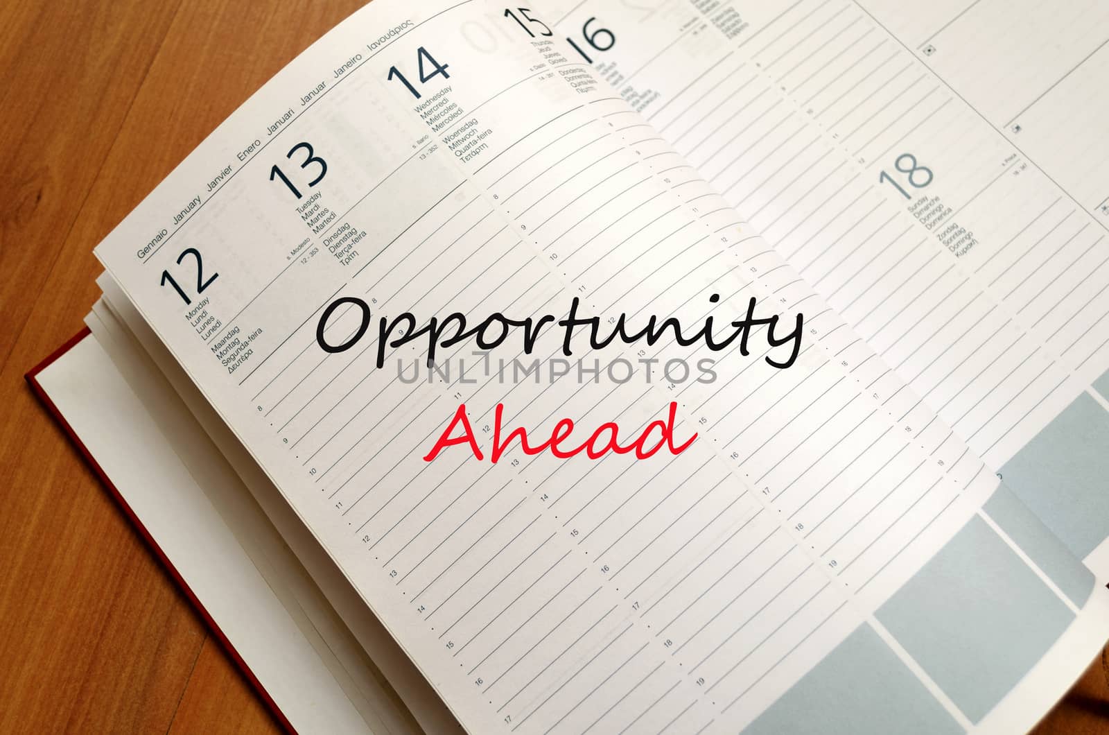 Business Notepad on wooden table Opportunity Ahead Concept