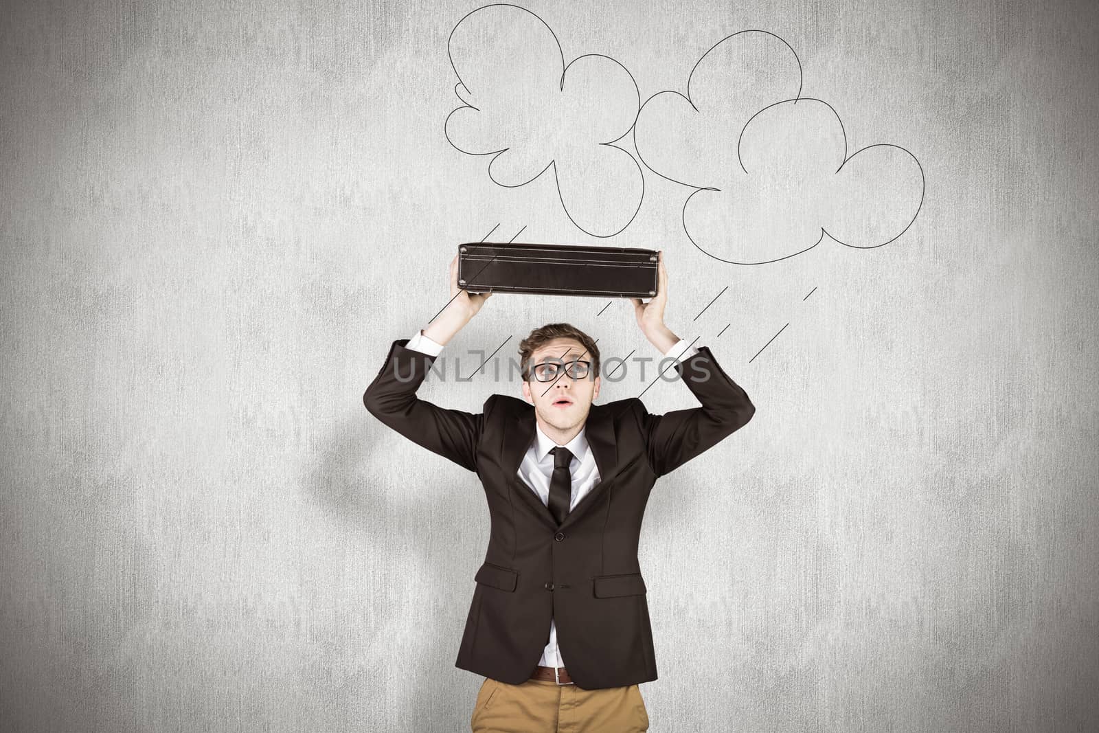 Composite image of young geeky businessman holding briefcase by Wavebreakmedia