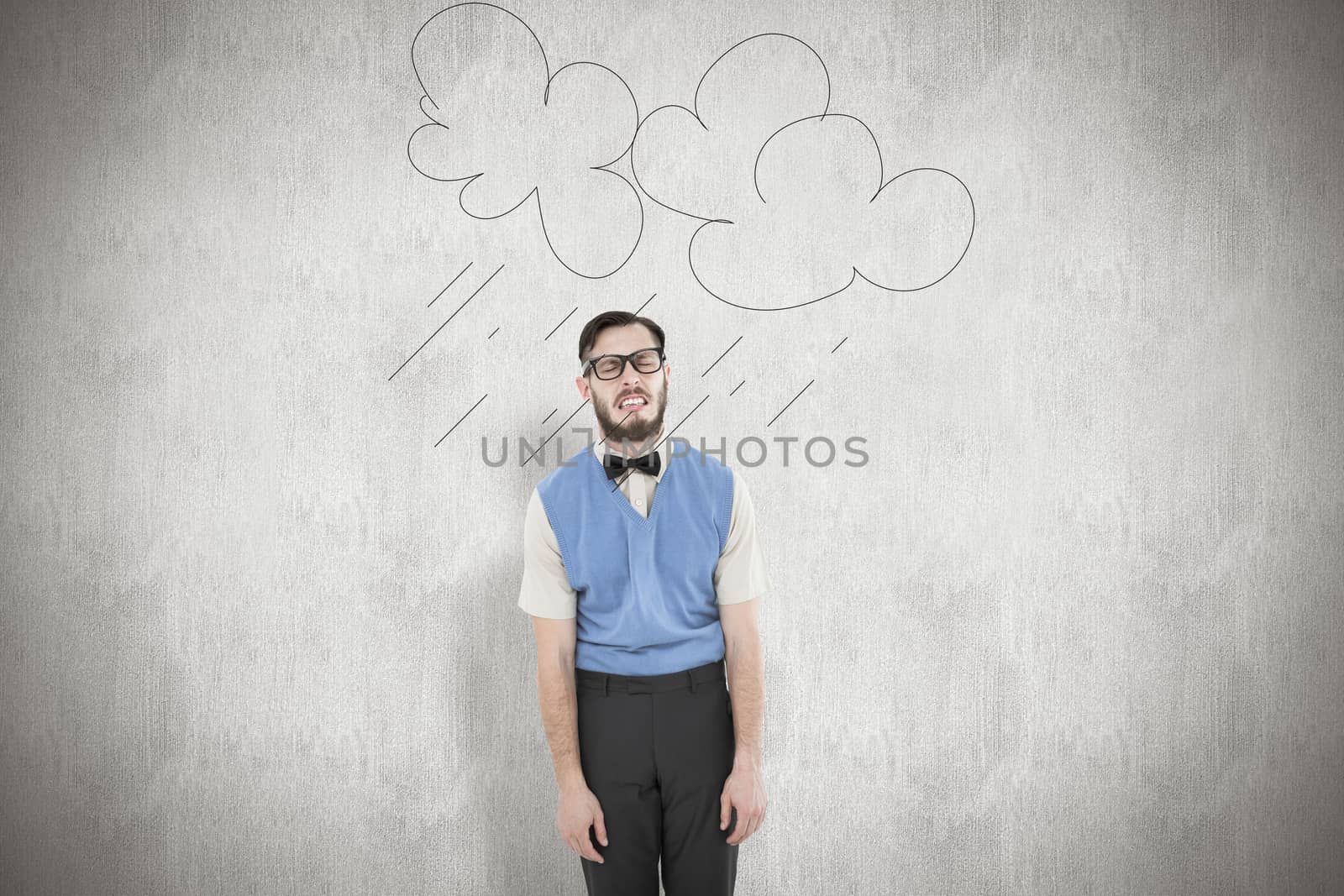 Geeky hipster pulling a silly face against white background