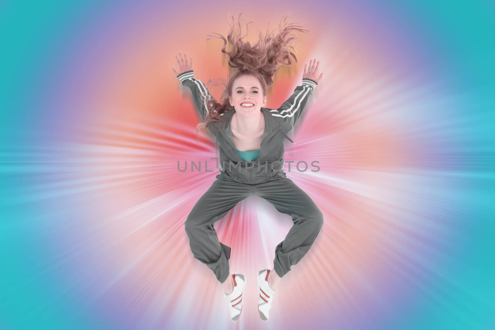 Composite image of full length of a sporty young blond jumping by Wavebreakmedia