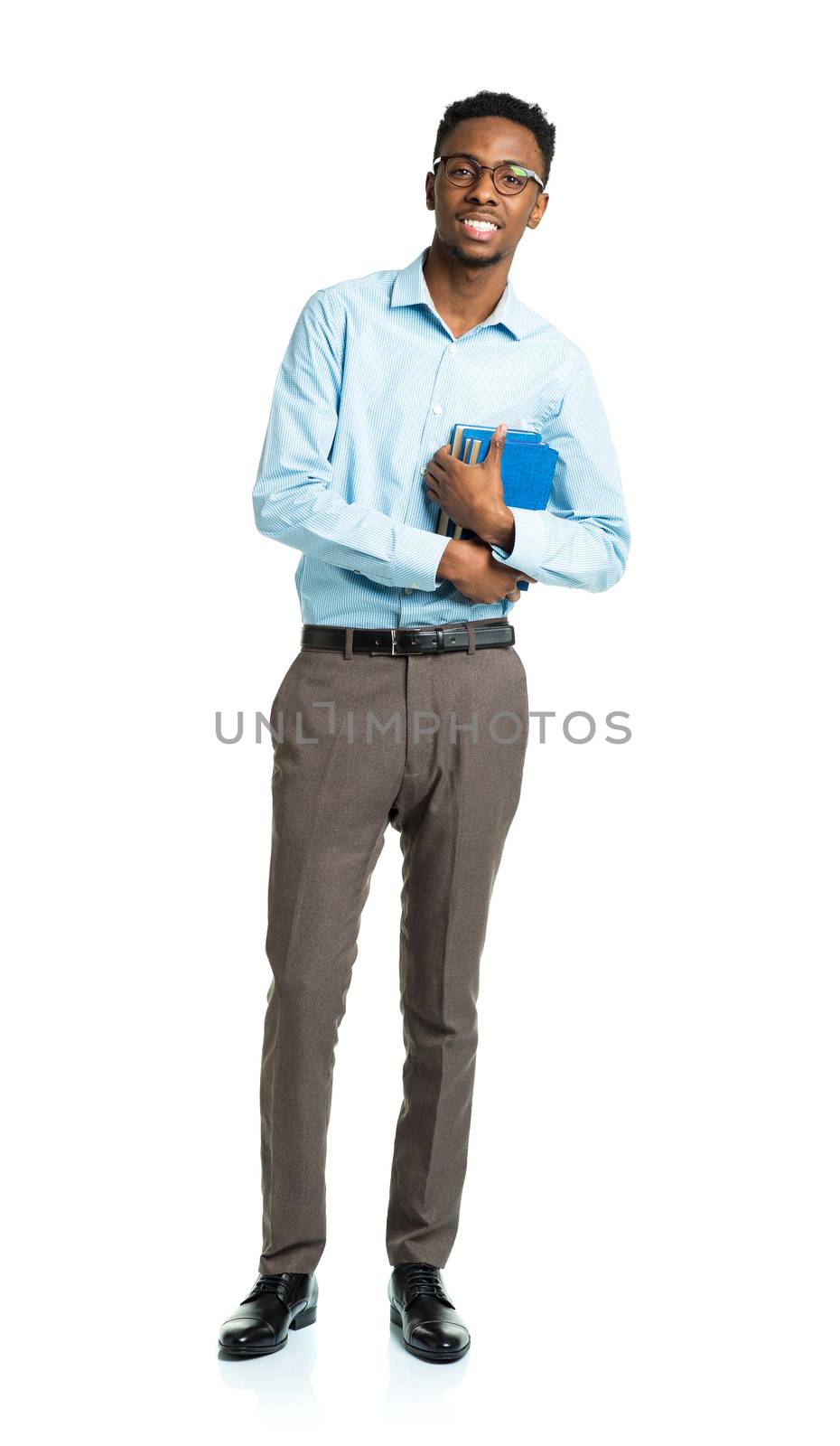 Happy african american college student with books in his hands standing on white background