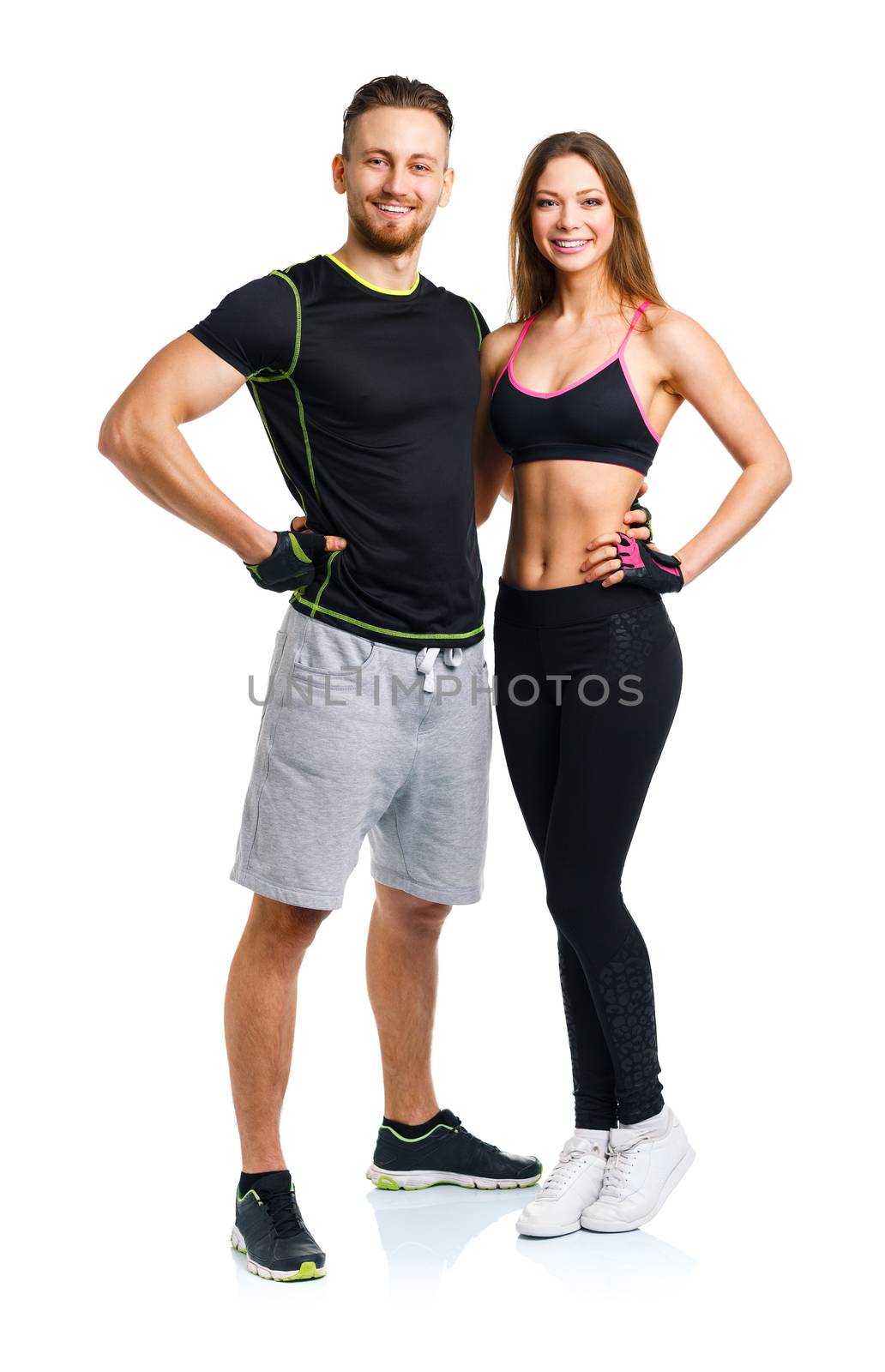 Athletic man and woman after fitness exercise on the white by vlad_star