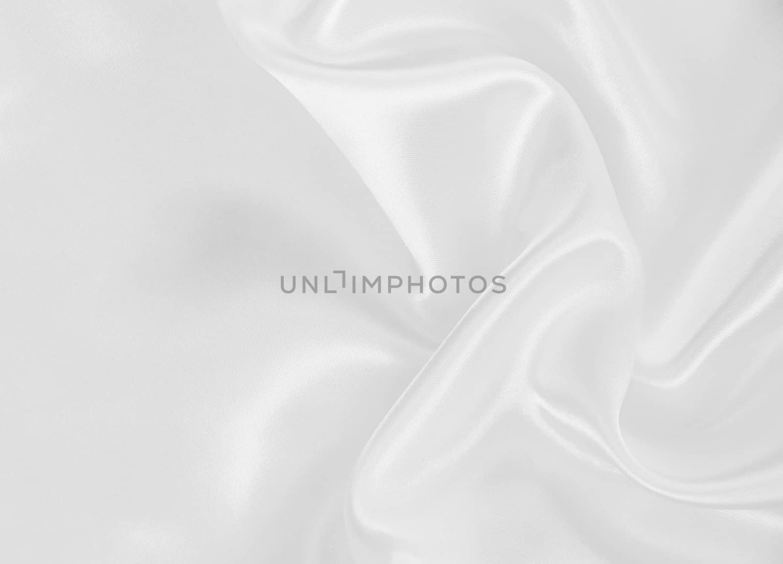 Smooth elegant white silk or satin texture as wedding background by oxanatravel