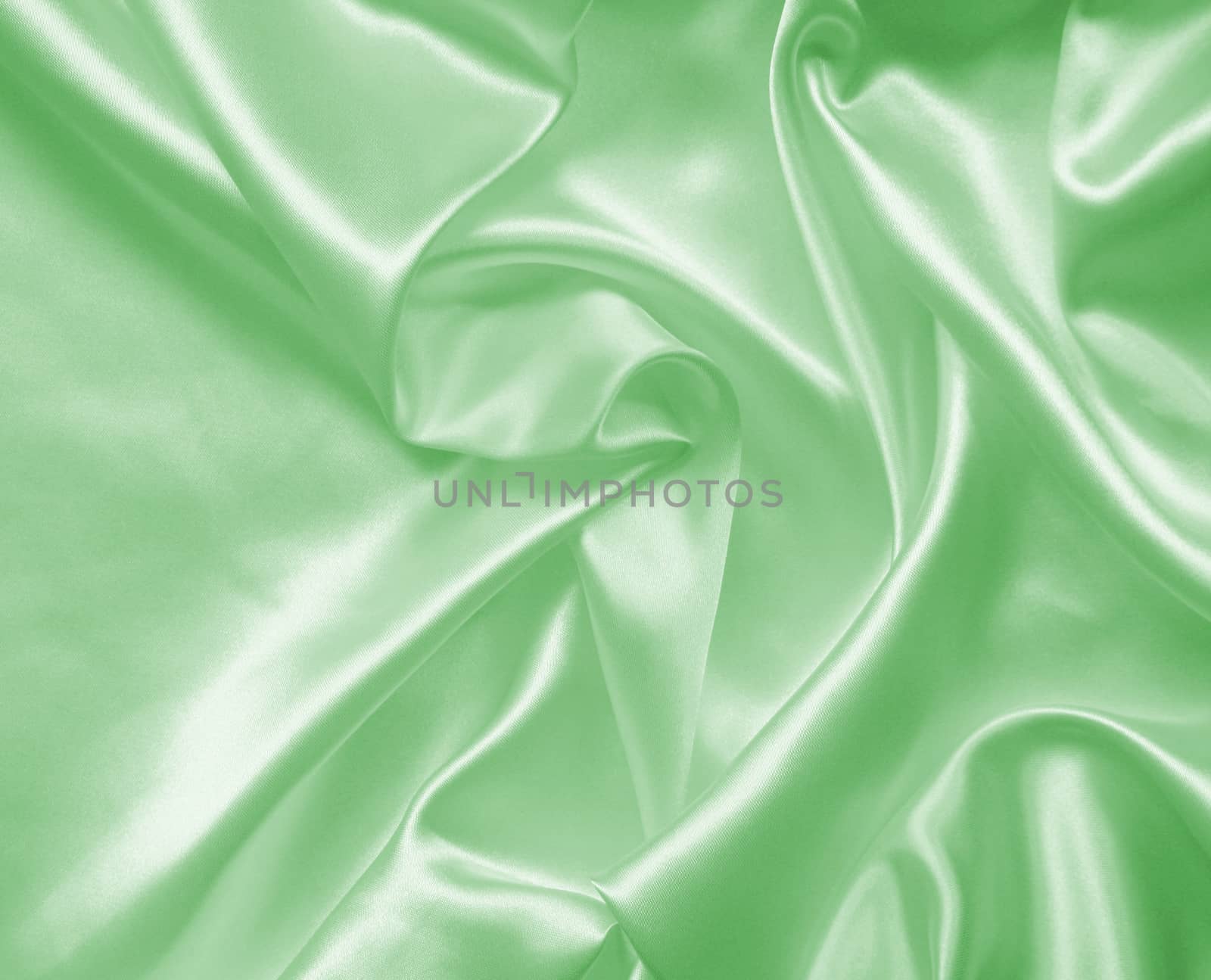 Smooth elegant green silk or satin texture as background  by oxanatravel