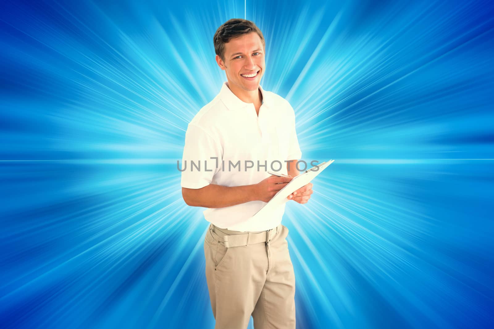 Smiling male trainer with clipboard in gym at hospital against abstract background