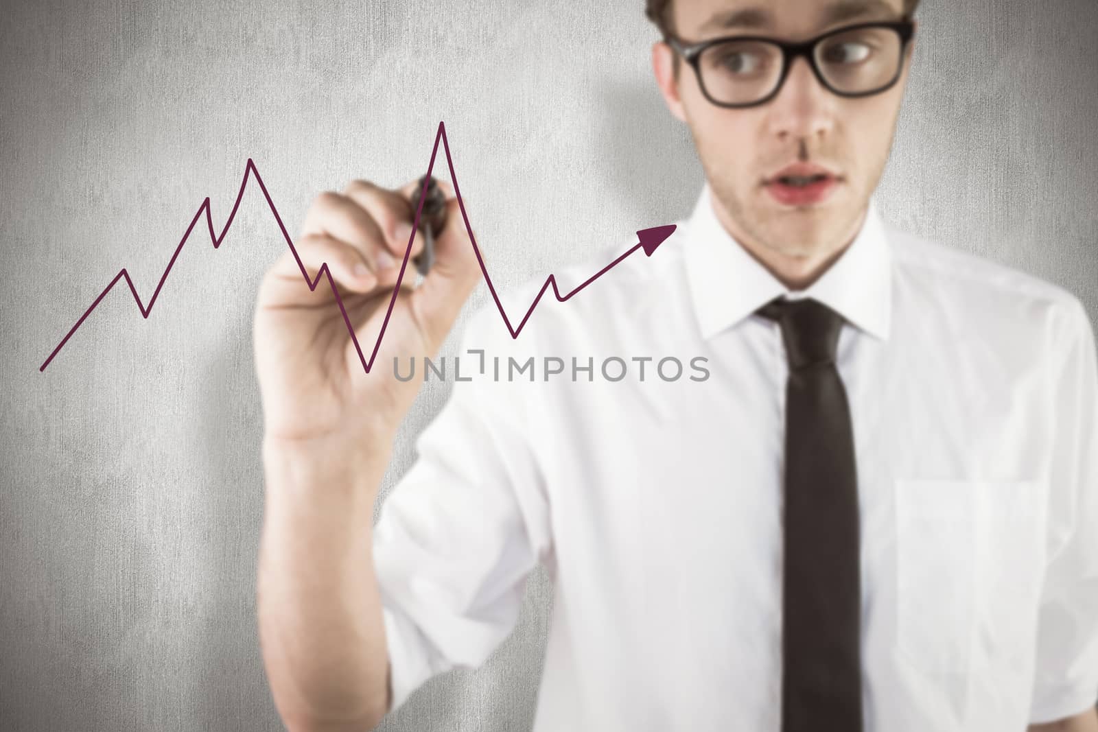 Composite image of geeky businessman writing with marker by Wavebreakmedia