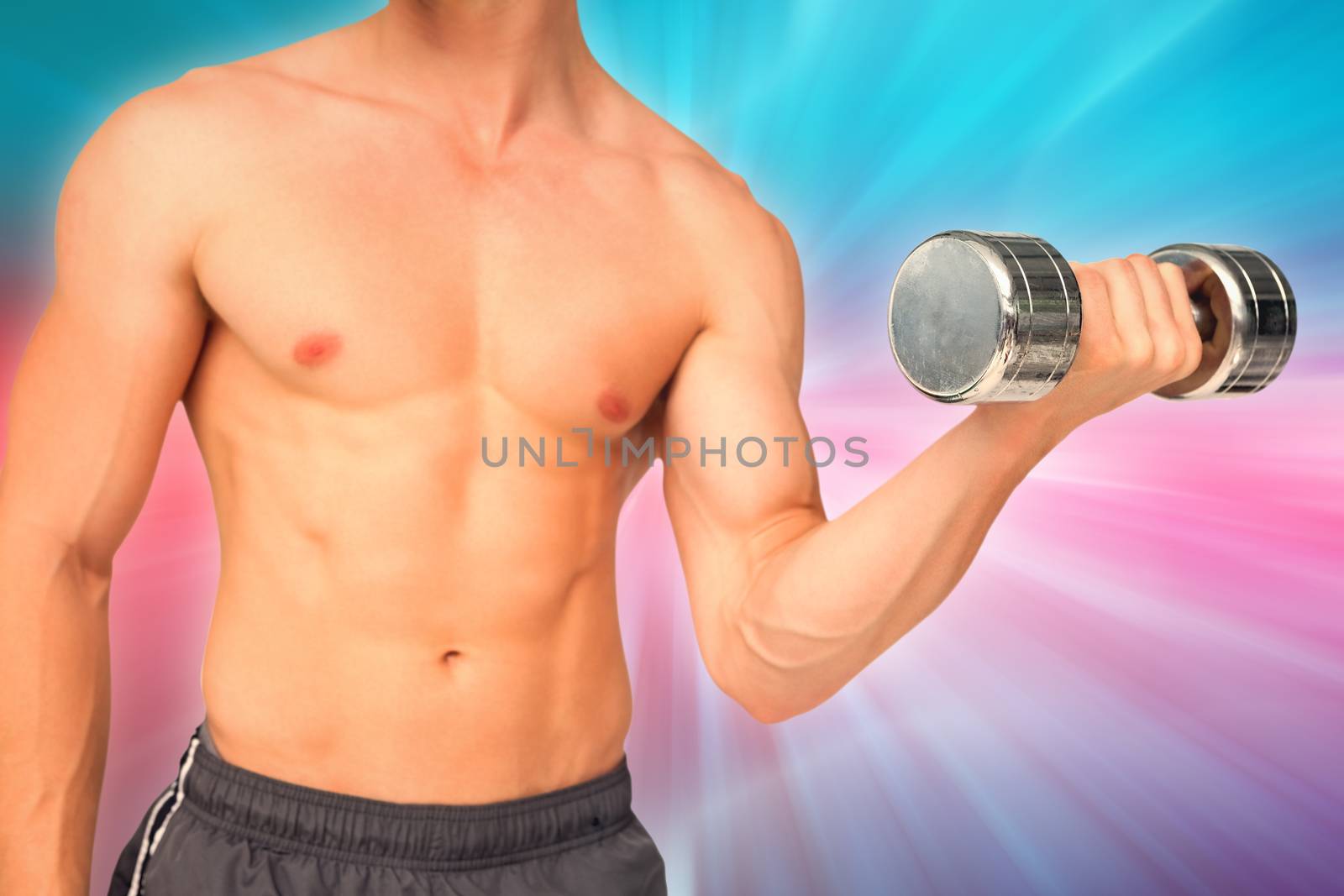 Fit shirtless man lifting dumbbell  against abstract background