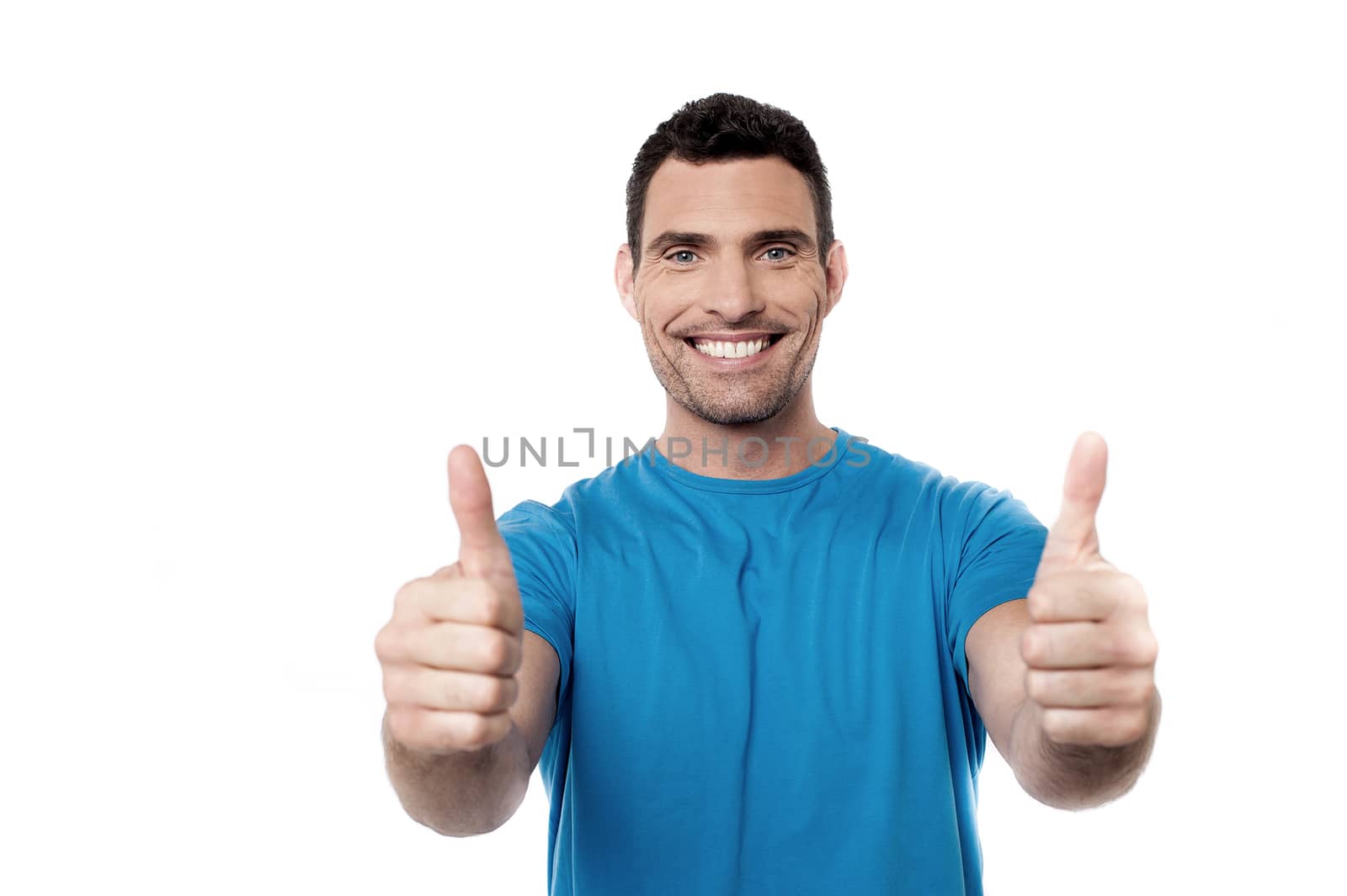 Smiling guy showing double thumbs up